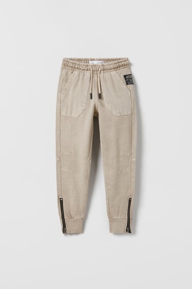 Image 0 of PLUSH FADED TROUSERS WITH ZIPS from Zara