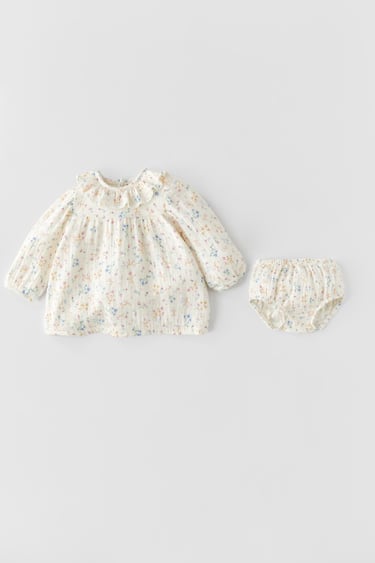 Image 0 of TEXTURED WEAVE FLORAL DRESS from Zara