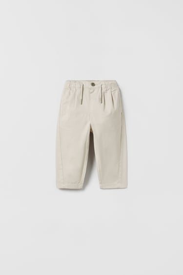 Image 0 of PLAIN DARTED TROUSERS from Zara