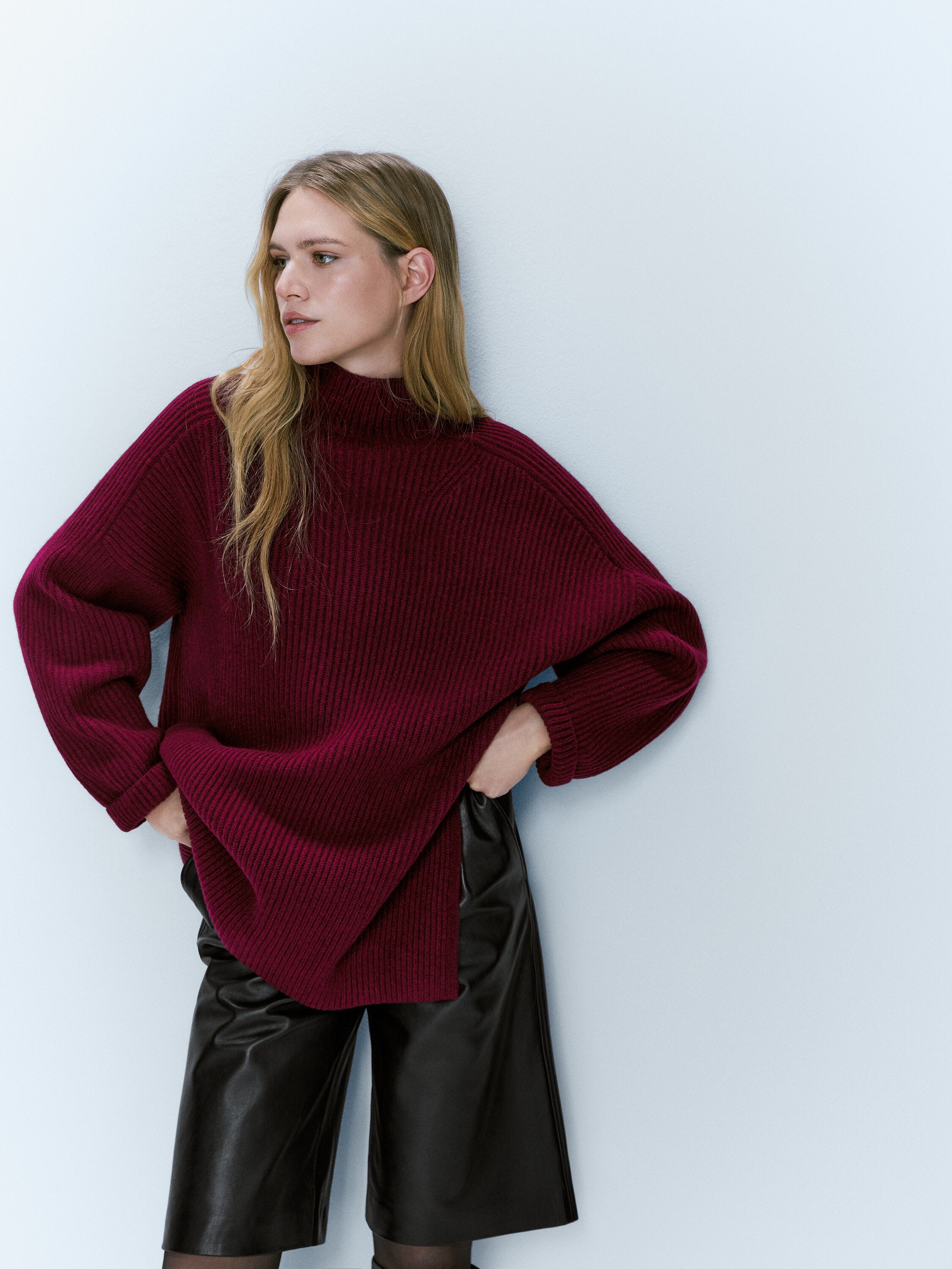 High neck sweater with side vents