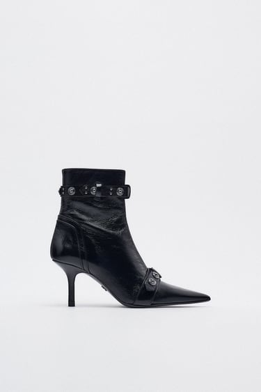 Image 0 of STUDDED STRAP LEATHER ANKLE BOOTS from Zara