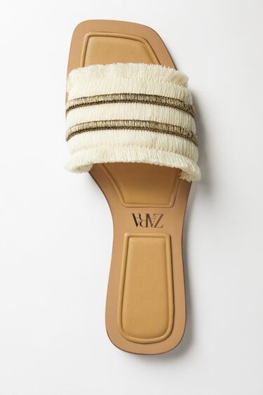 Image 0 of FLAT SANDALS WITH FRINGE from Zara
