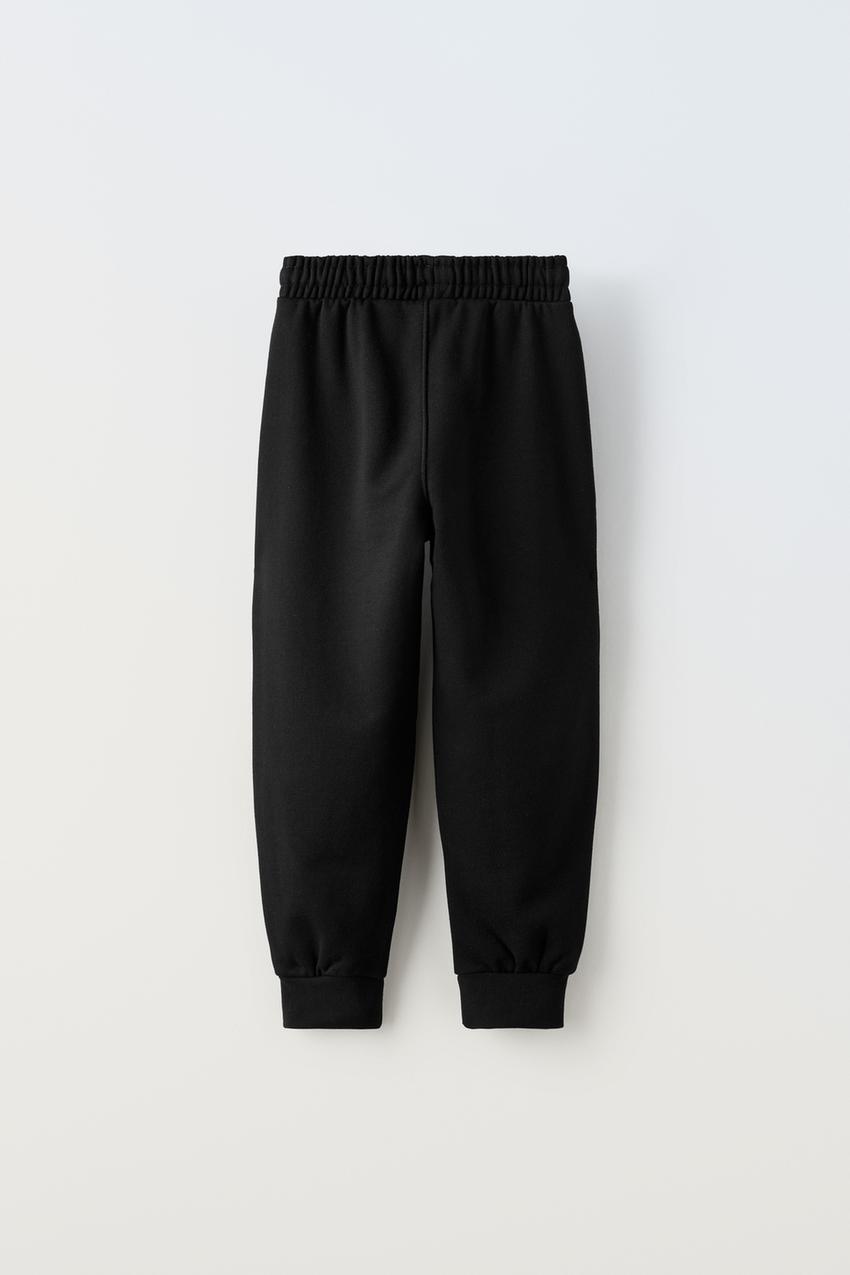 Pantalon negro sale zara