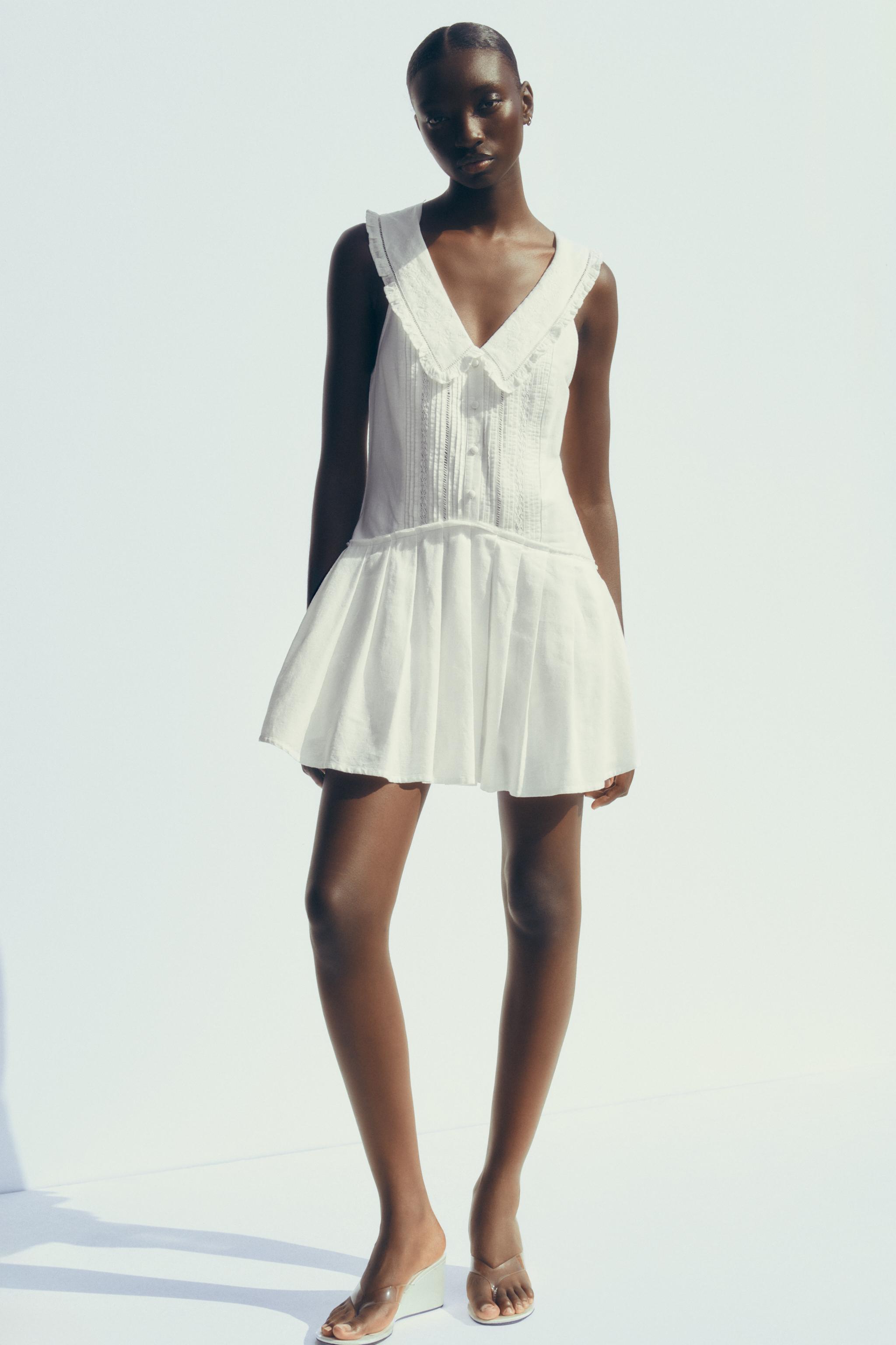 PLEATED SHORT DRESS WITH PETER PAN COLLAR