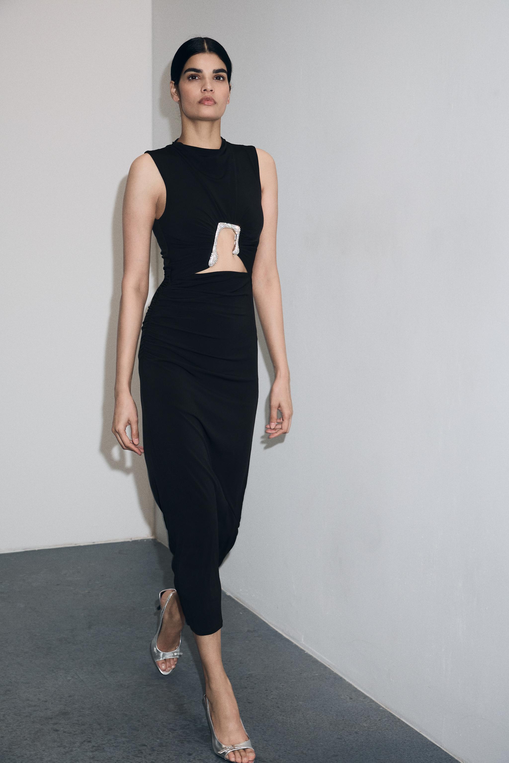 DRAPED CUT-OUT DRESS WITH SHINY DETAIL
