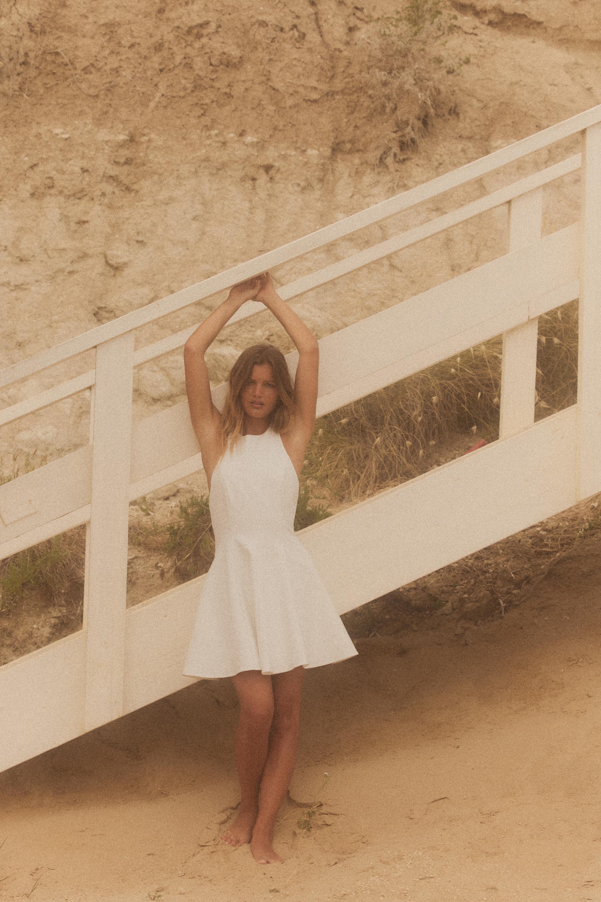 SHORT HALTER GODET DRESS