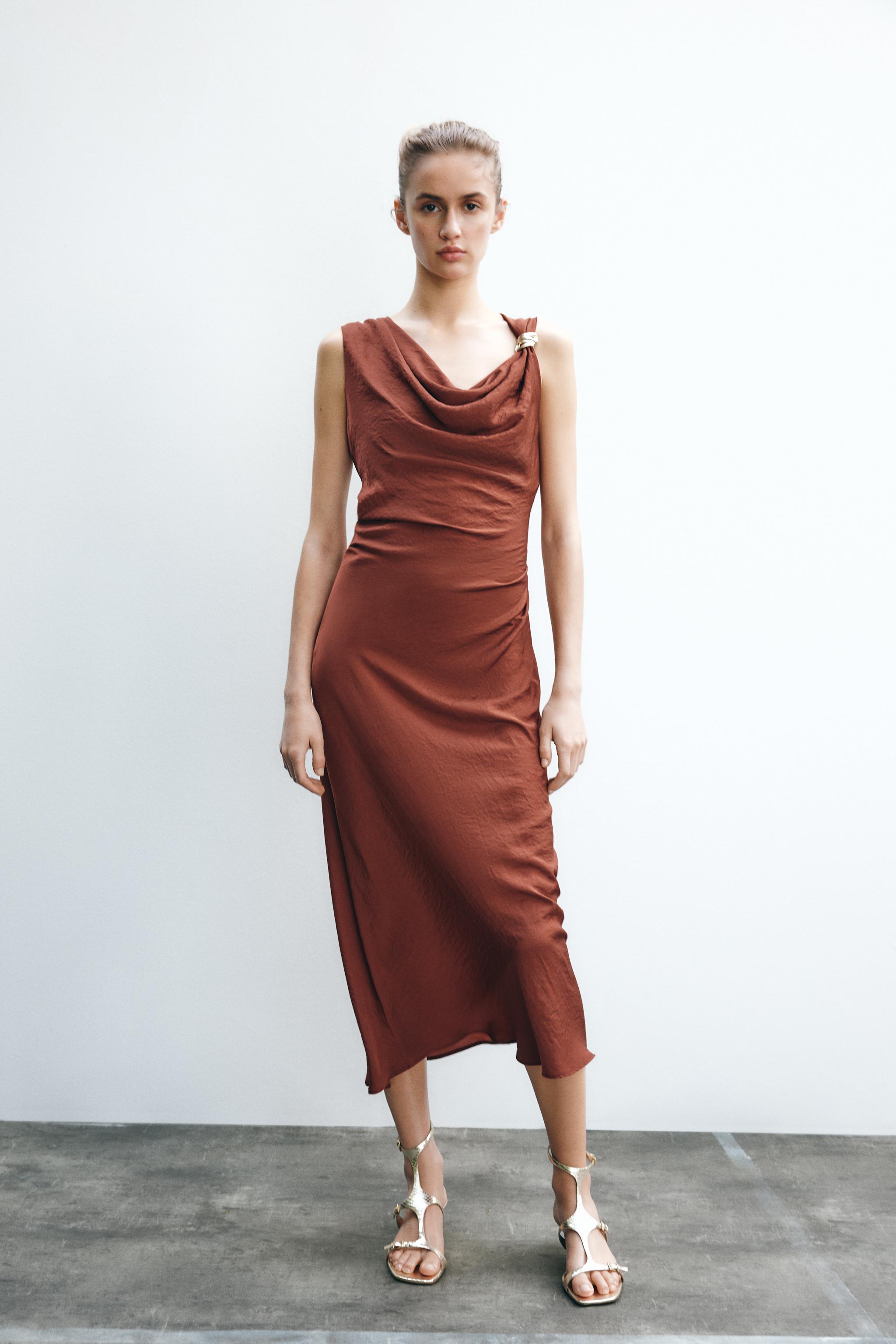 MIDI DRESS WITH GOLDEN APPLIQUÉ