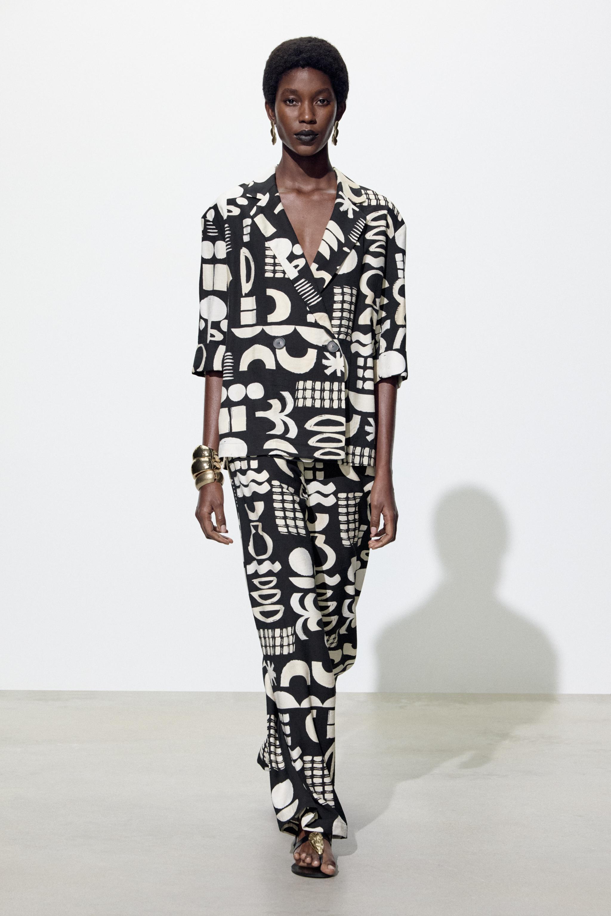 STRAIGHT FIT TROUSERS