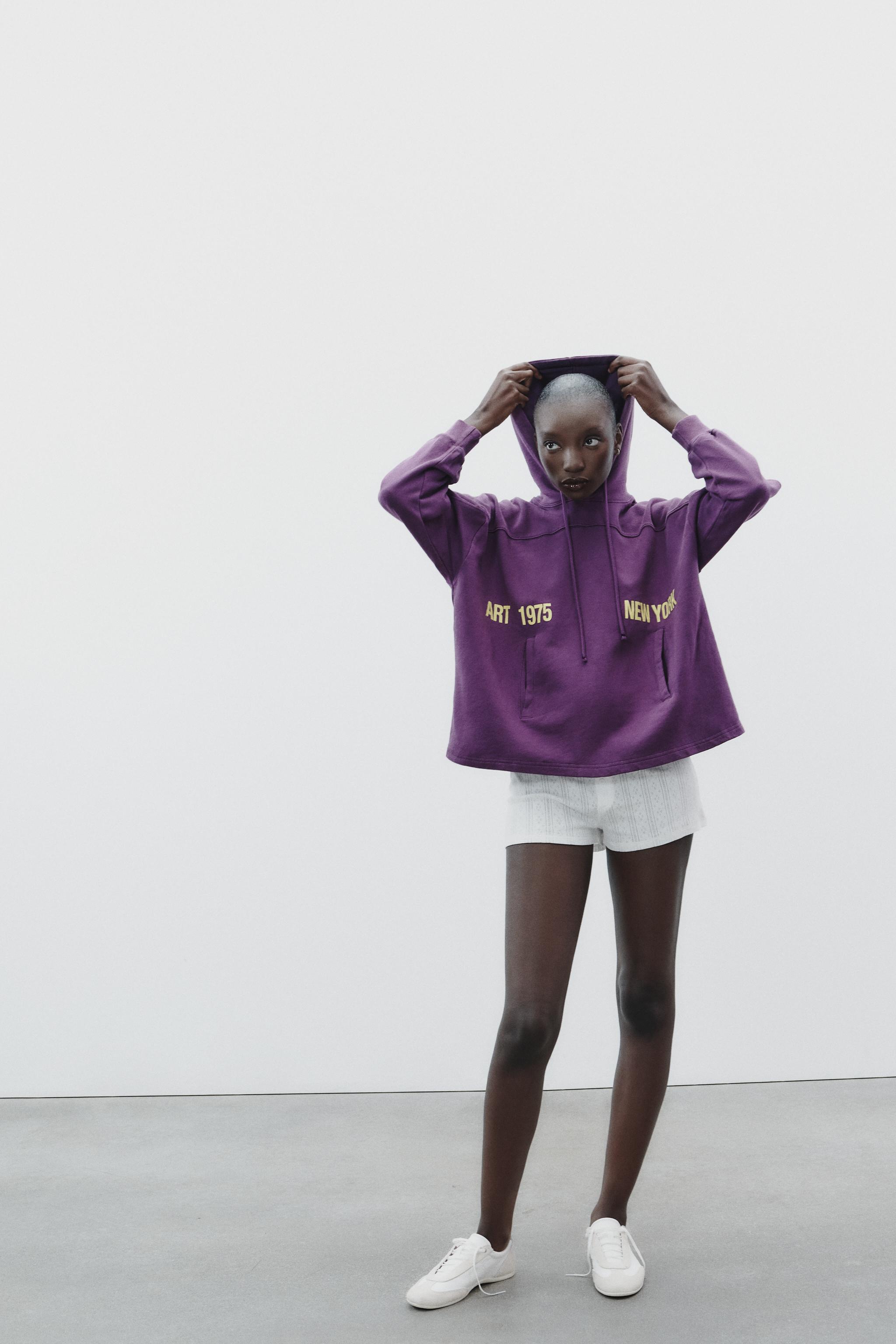 HOODIE WITH SLOGAN