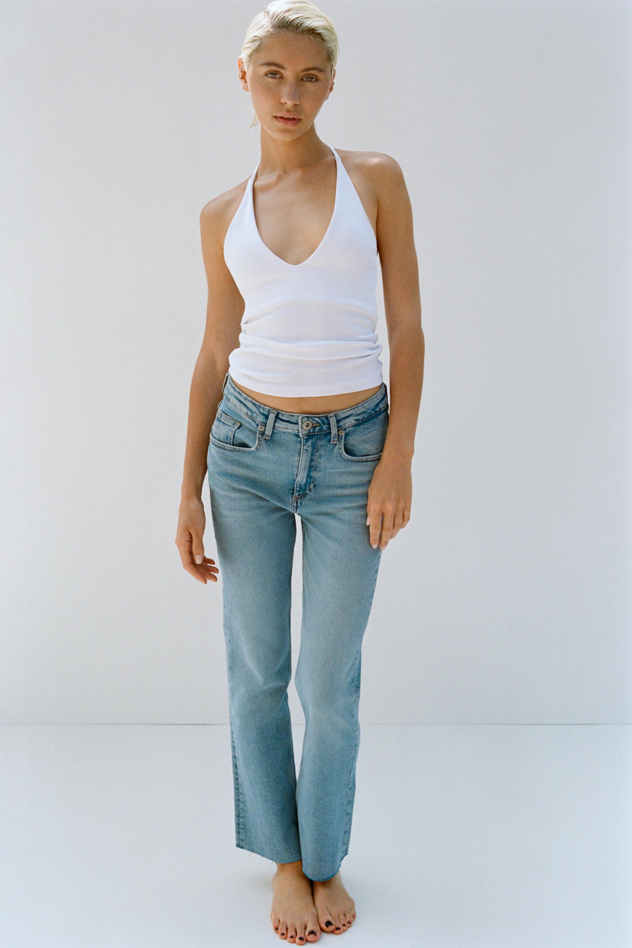 HALTER TOP WITH STRAP DETAIL