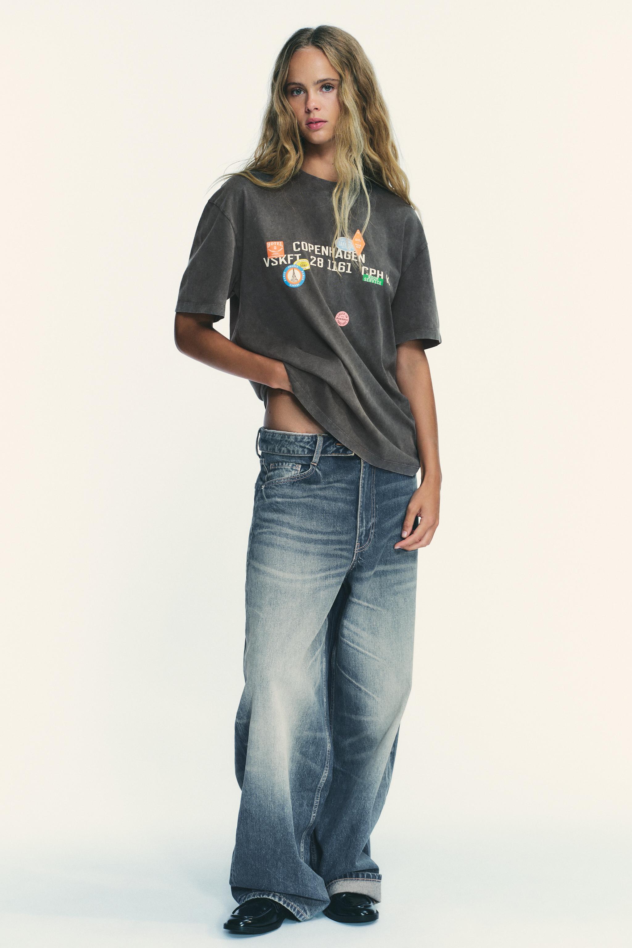 WASHED-EFFECT T-SHIRT WITH PRINTED PATCHES