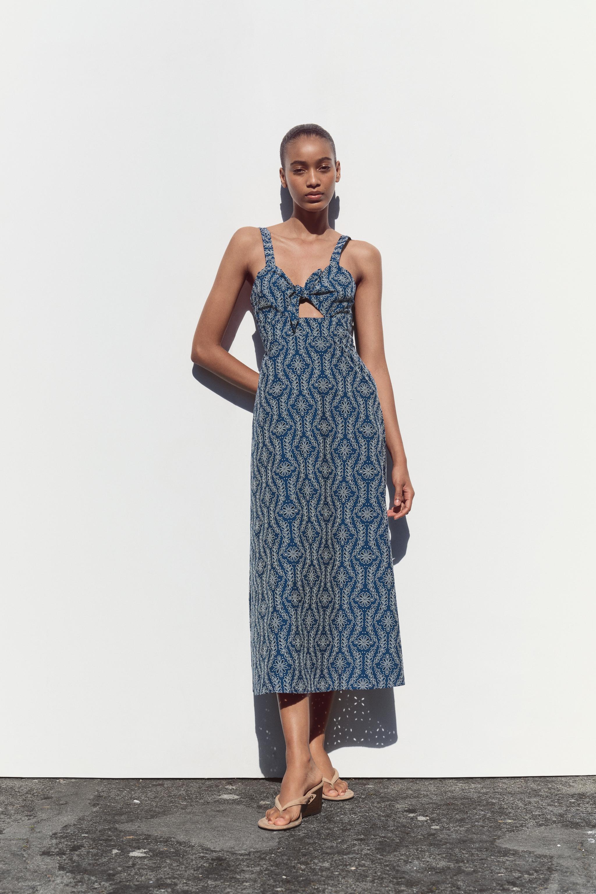 MIDI DRESS WITH RUBBERISED CUTWORK EMBROIDERY