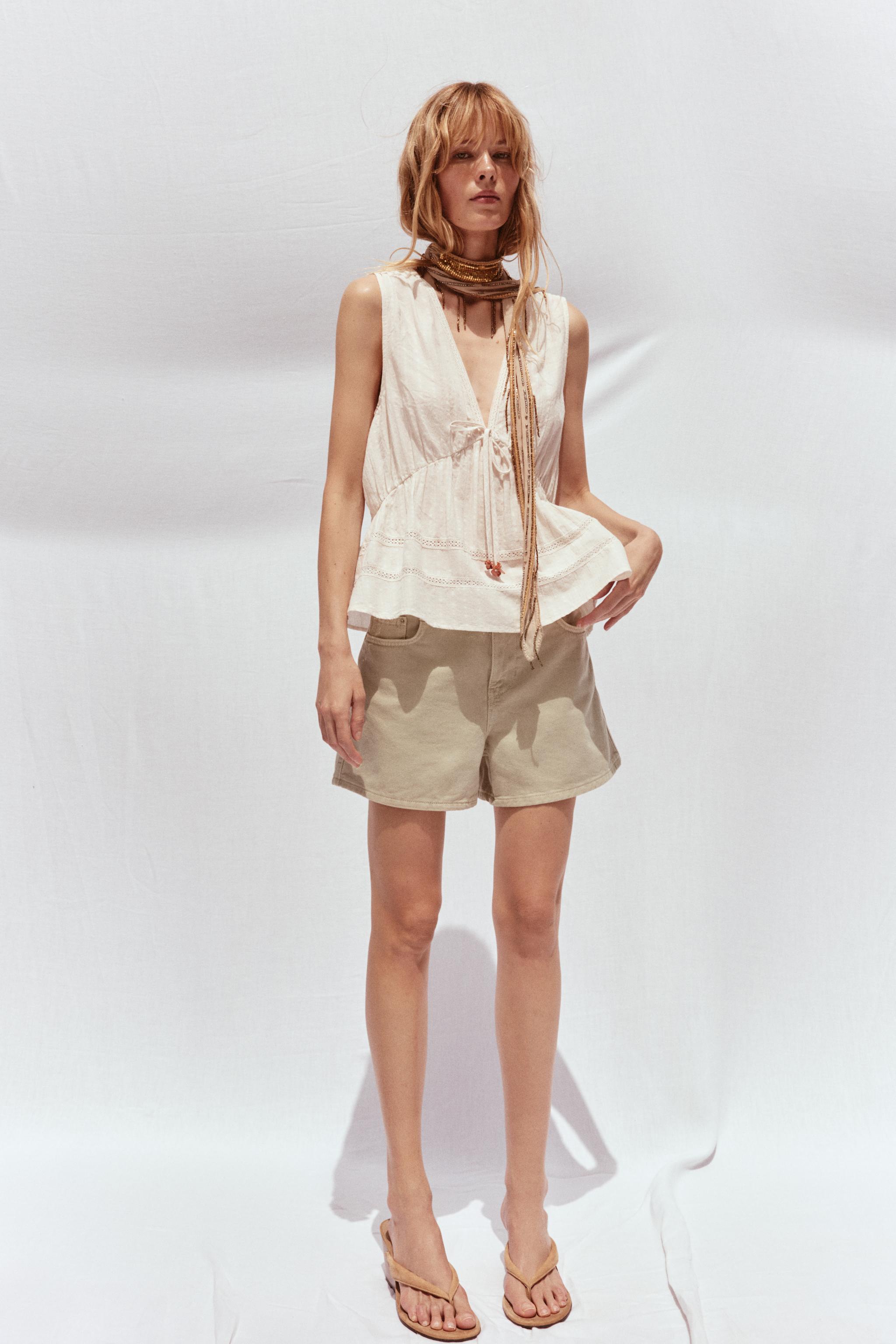 SLEEVELESS ENTREDEUX TOP