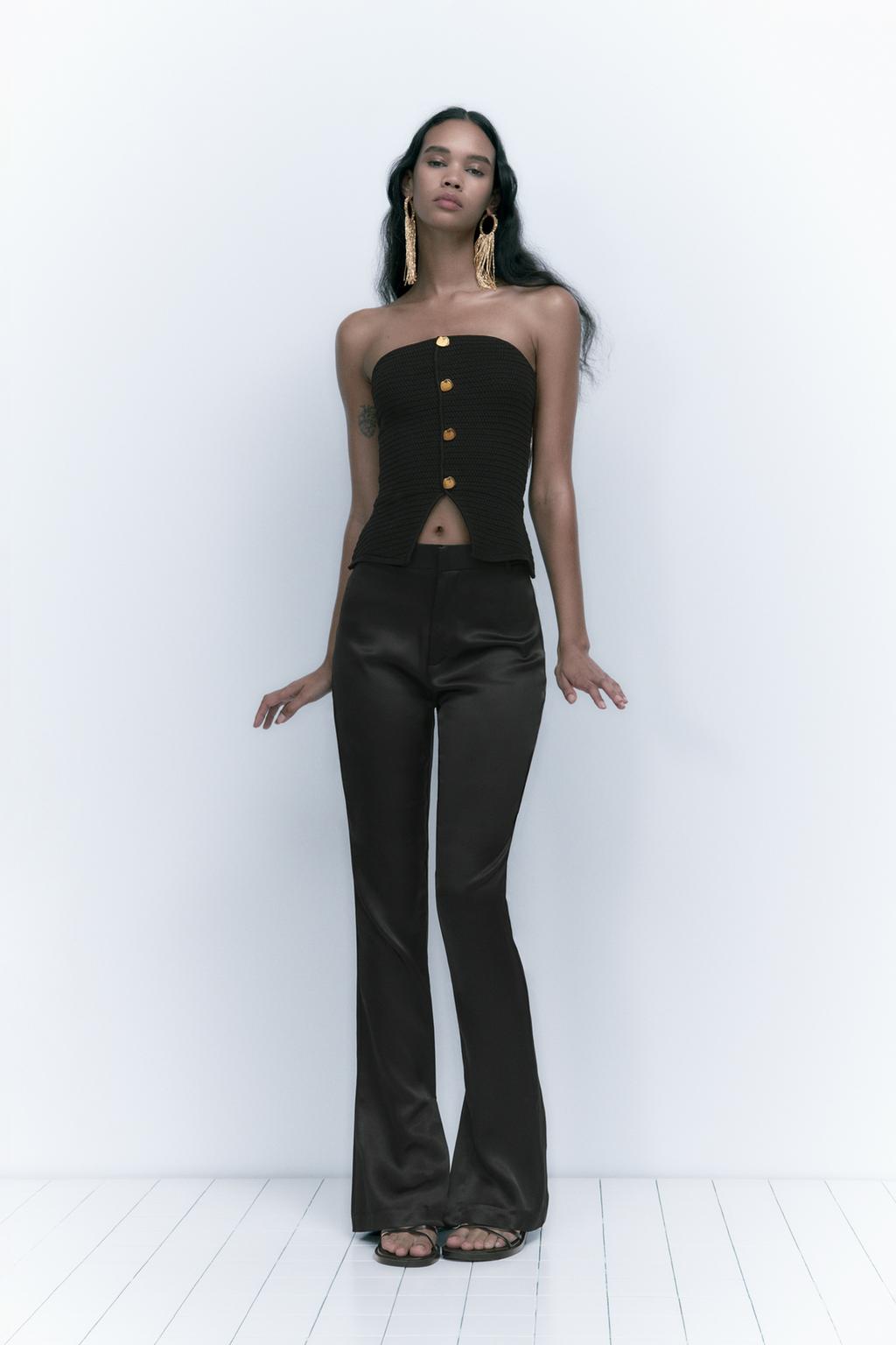 Knit top with gold buttons