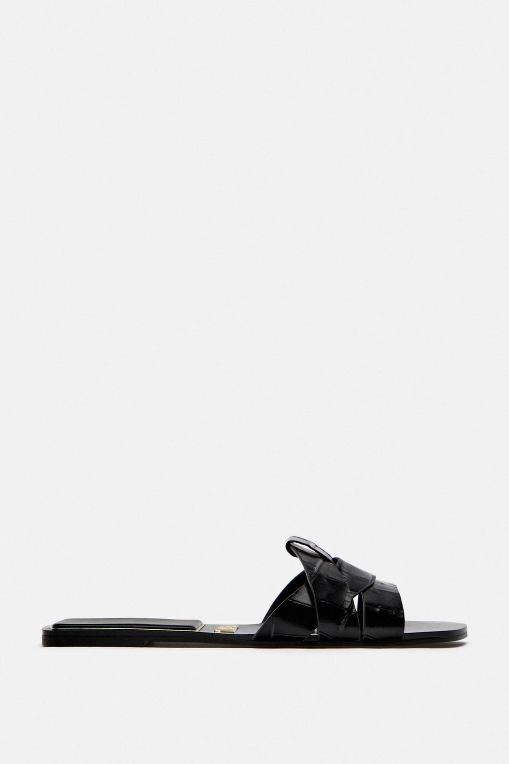 Flat crossover leather sandals