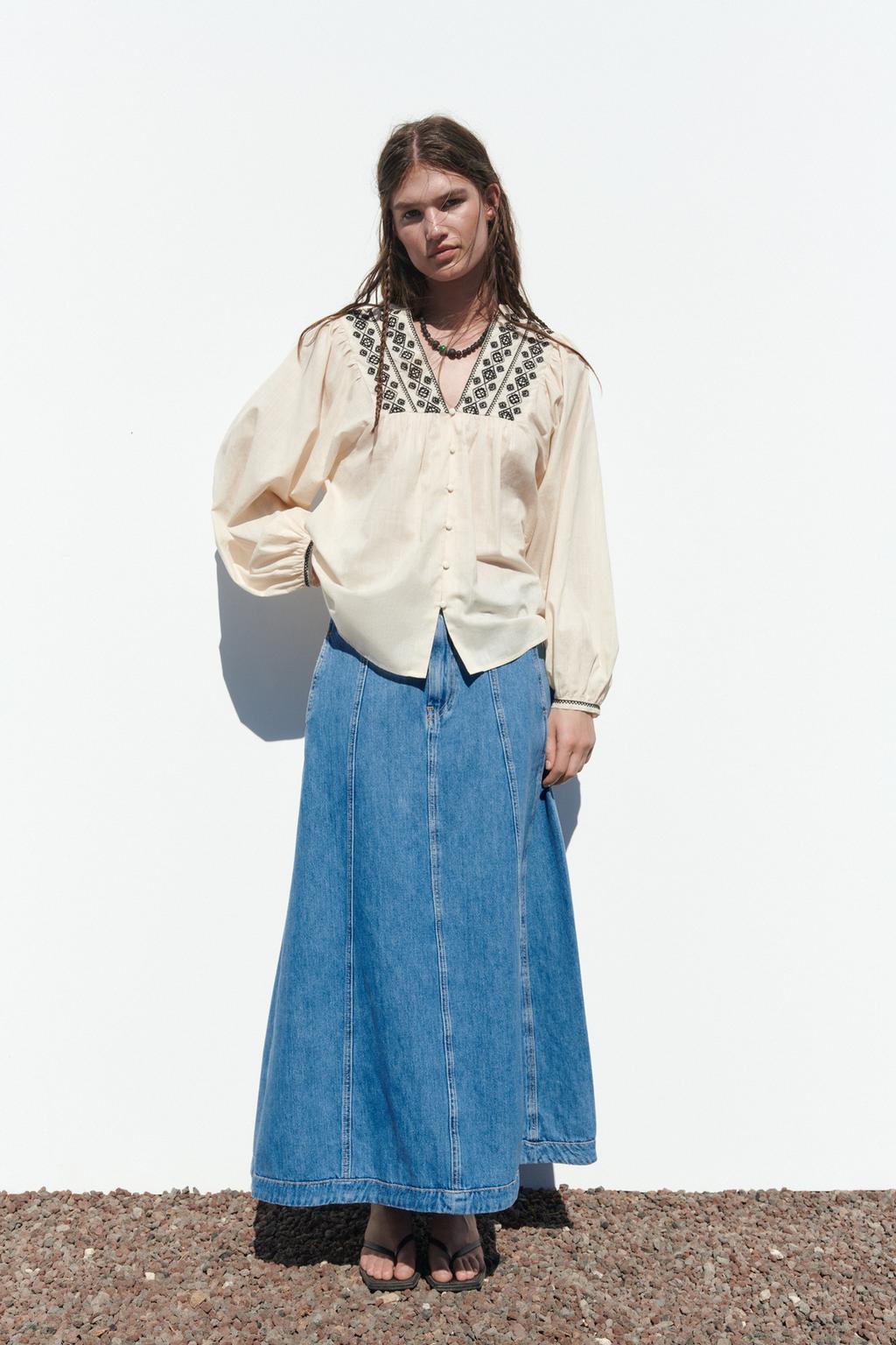 Top with pearl embroidery