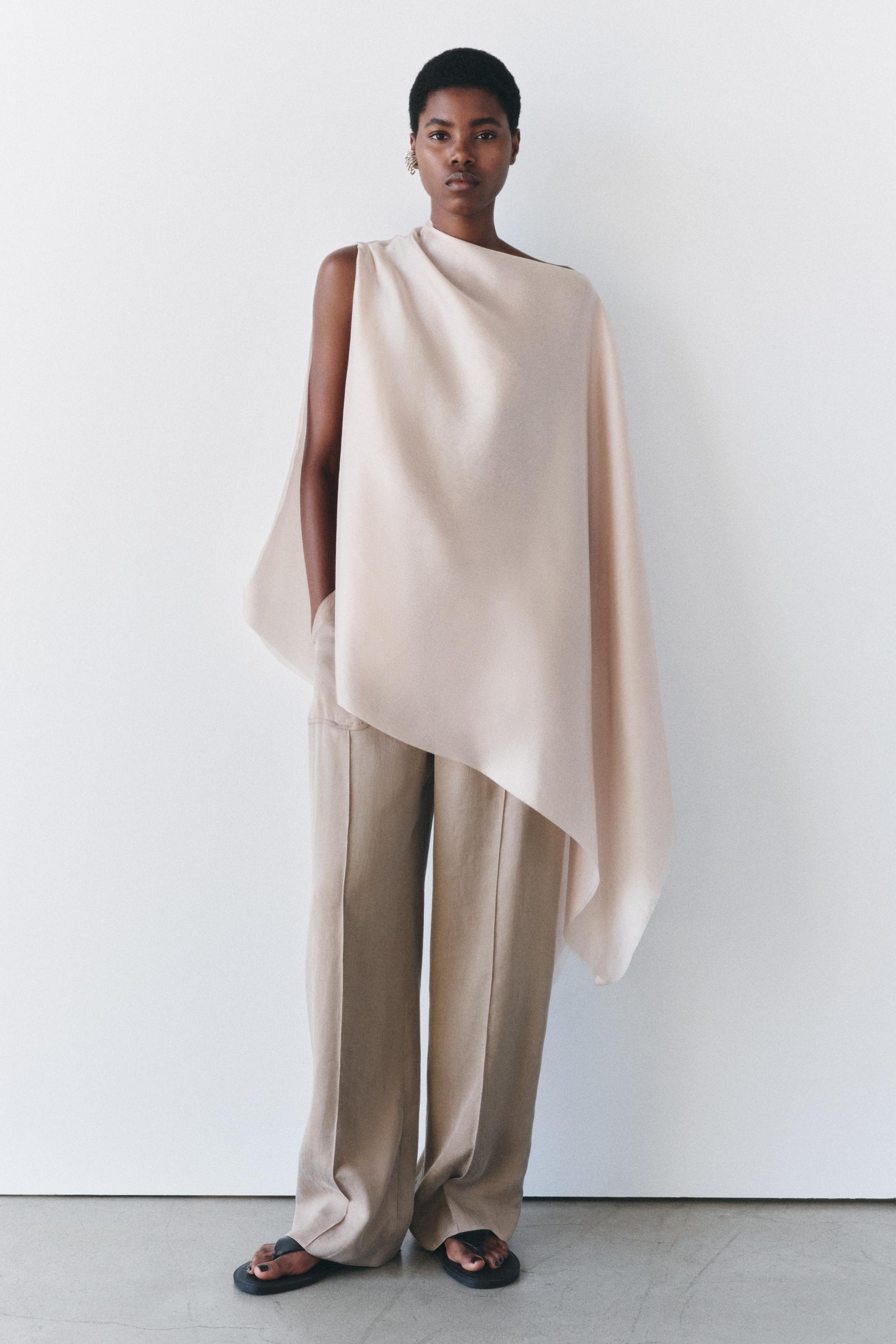 Asymmetric flowing cape