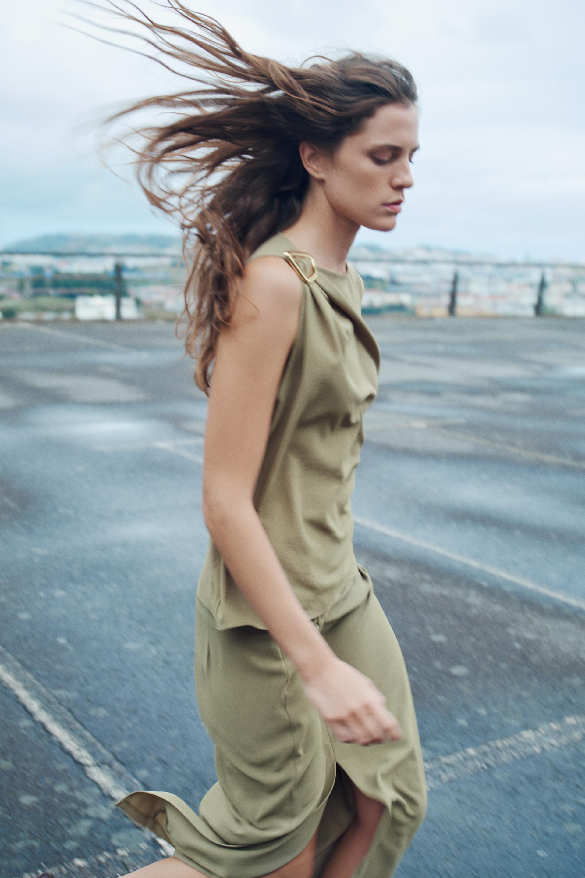 Buckle draped top