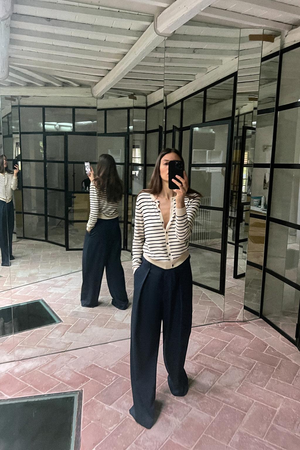 Trousers with waistband straps