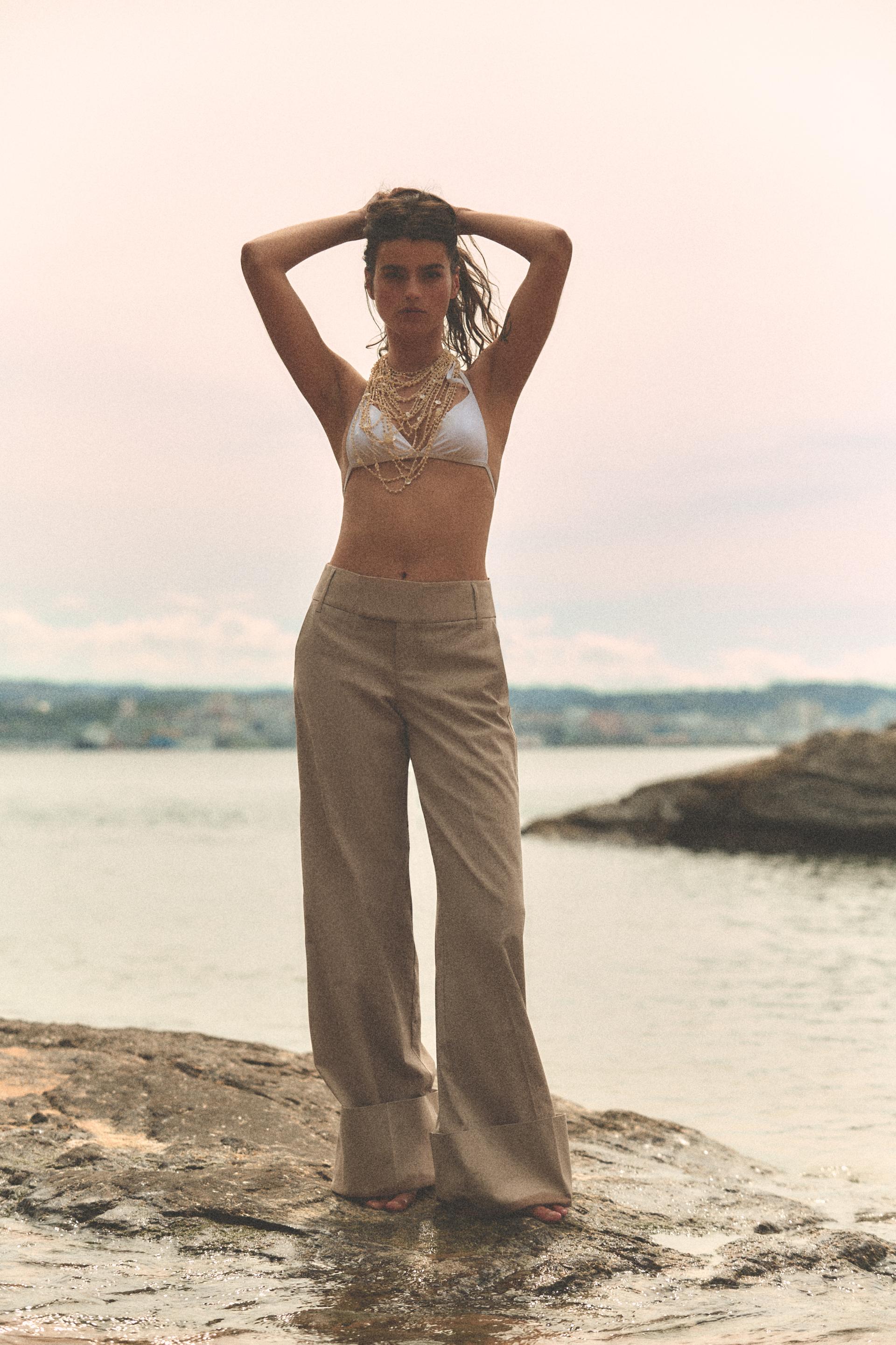 Straight-leg trousers with strap