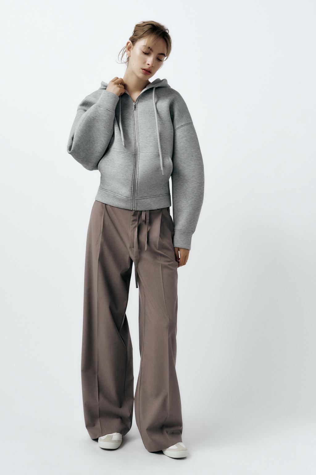 Pinstripe trousers with belt