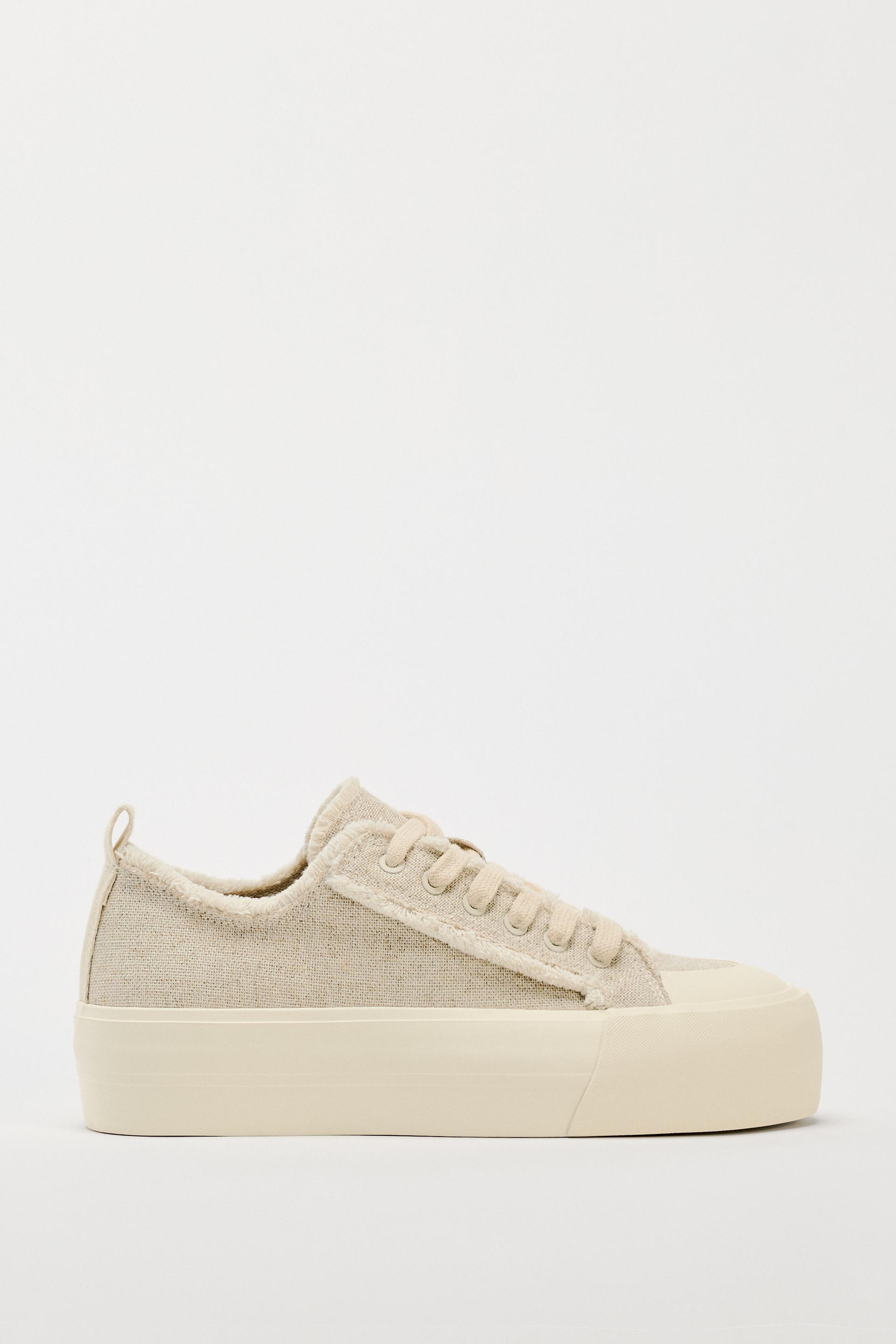 Frayed canvas sneakers