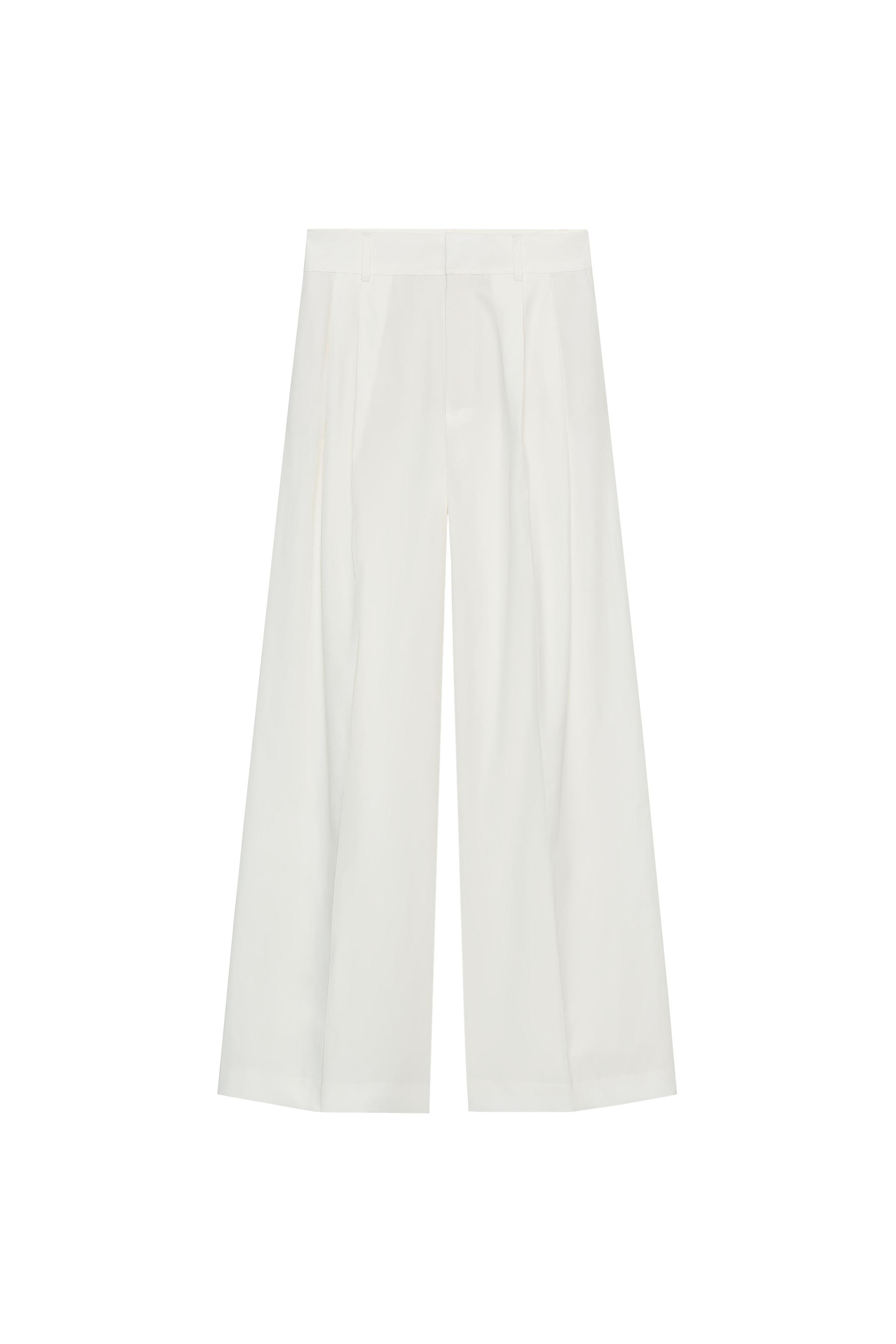 Pleated trousers with flaps