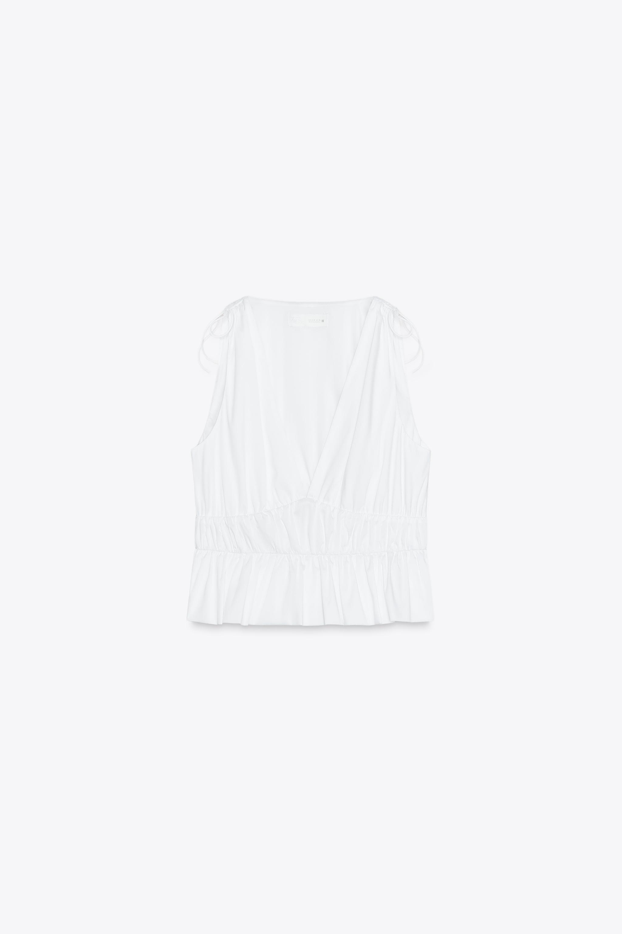 Satin top with ruched details