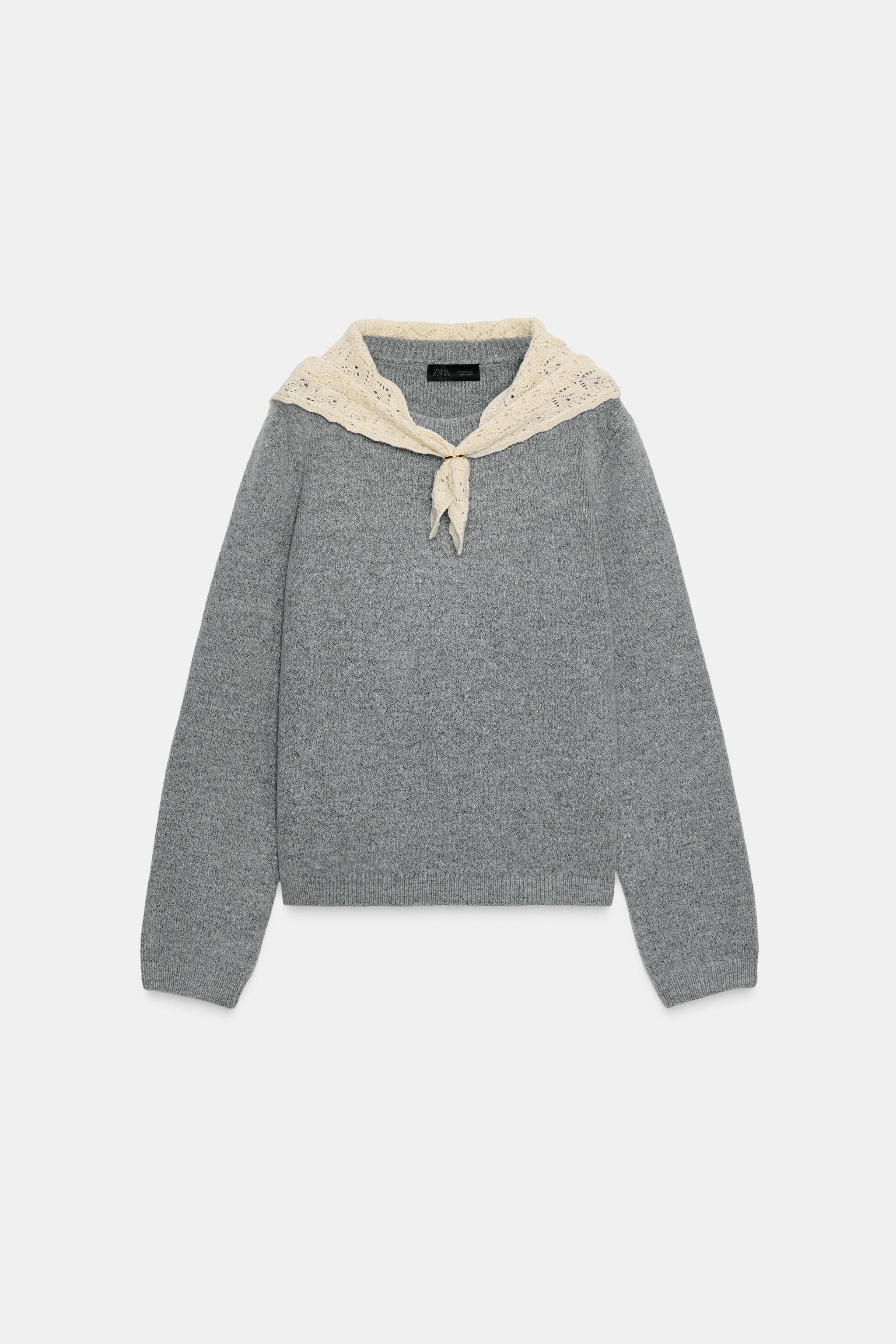 Knitted sweater with scarf