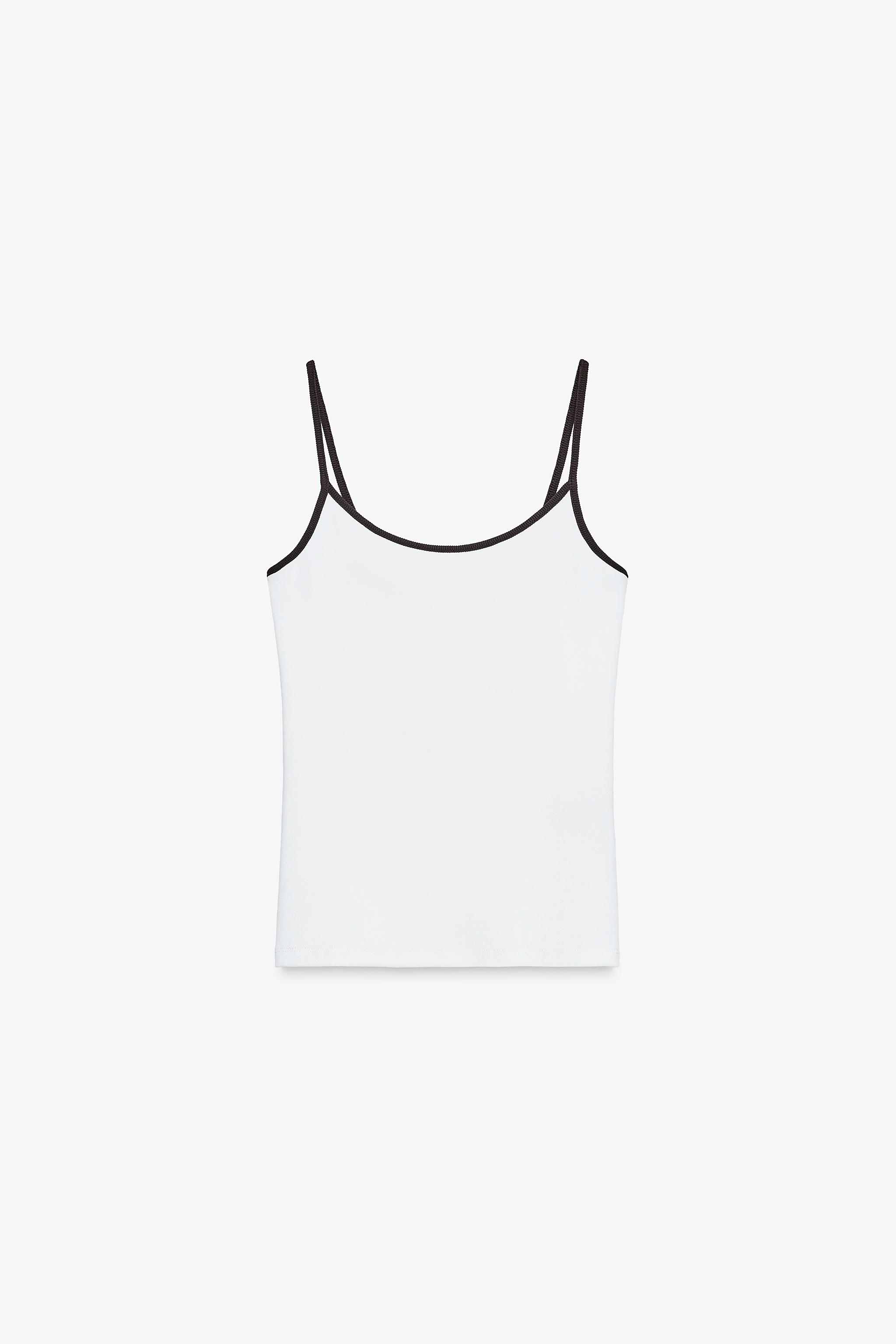 Top with contrast straps