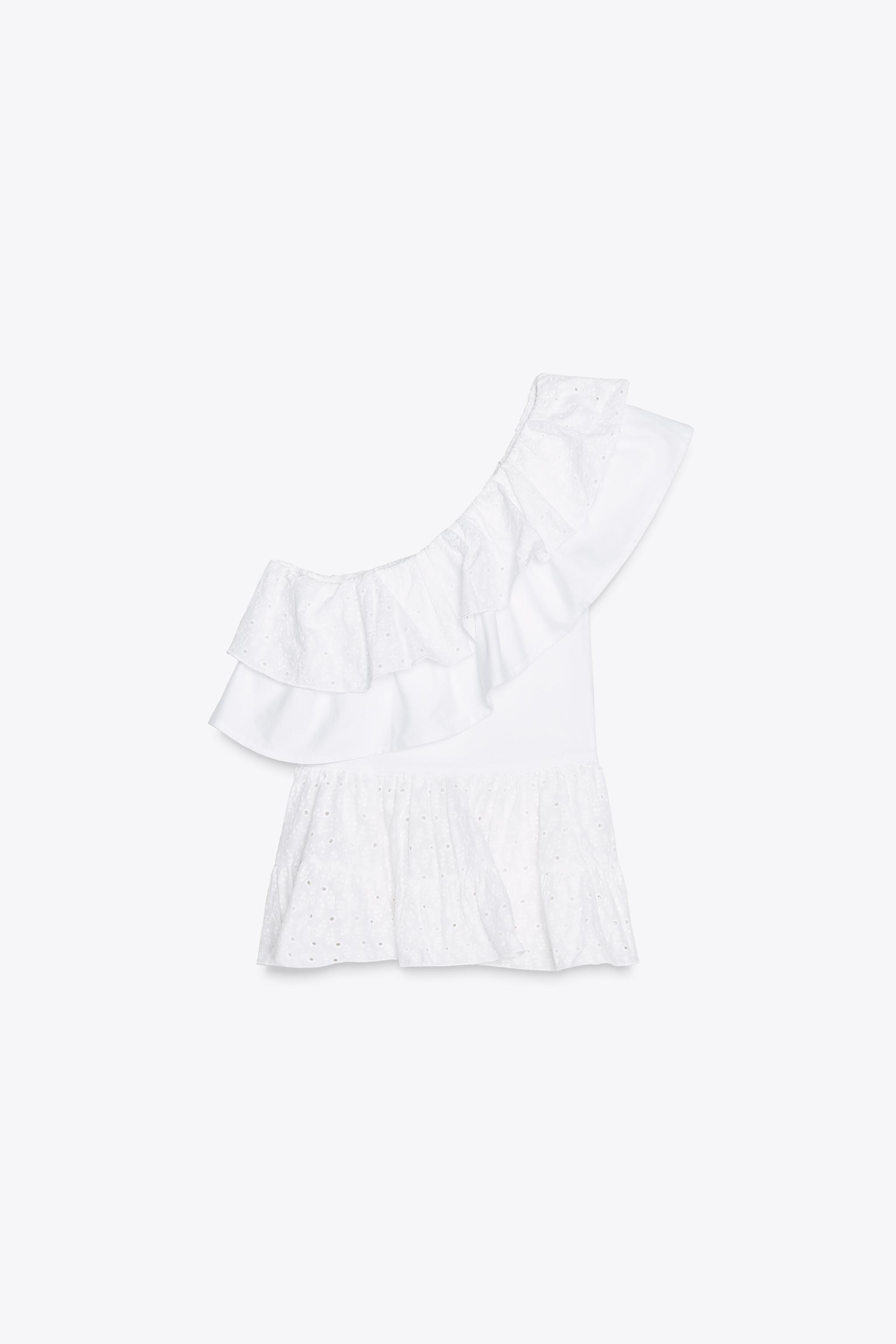 Asymmetric embroidered top