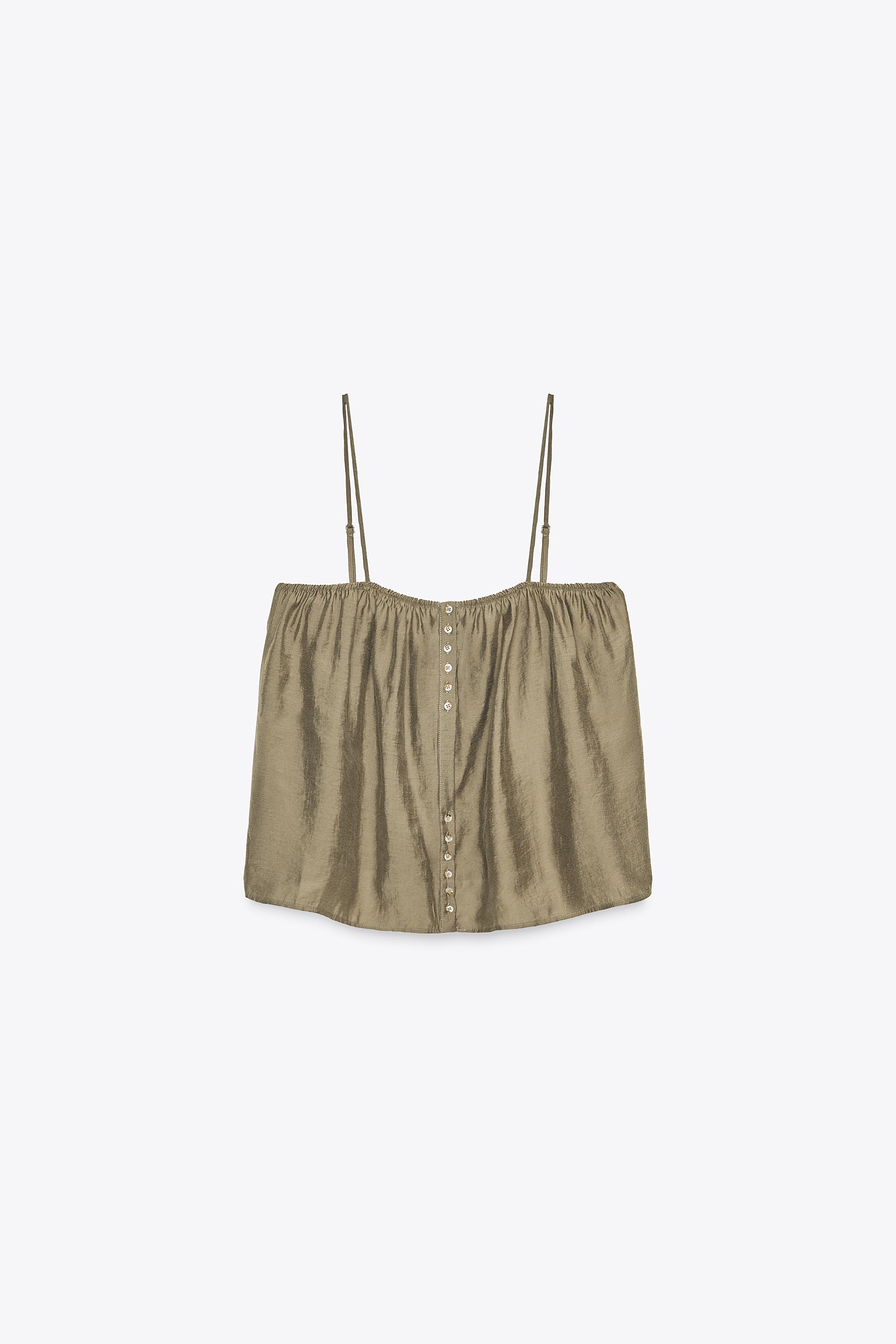 Loose buttoned strap top