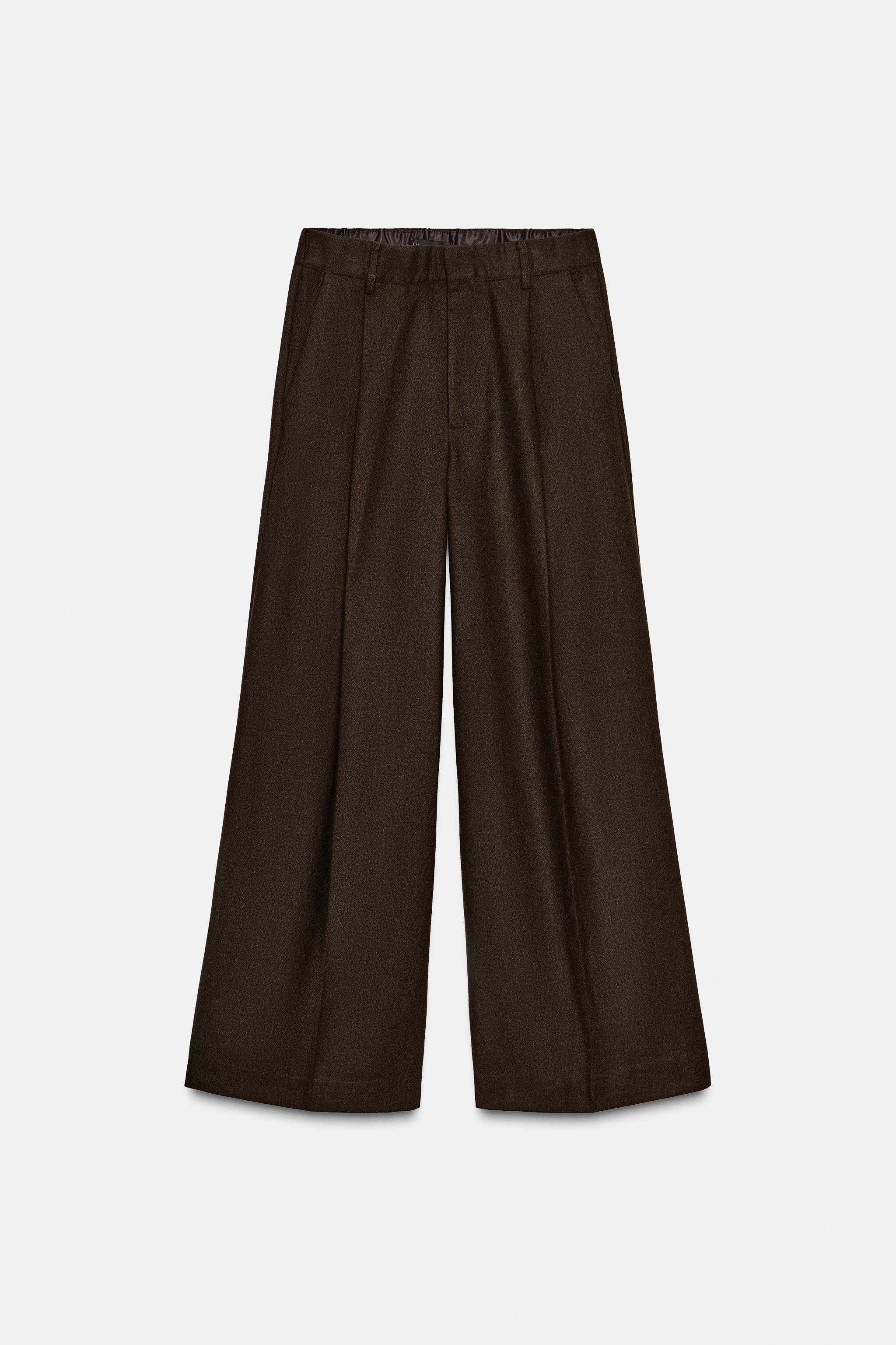 Trousers with pleats