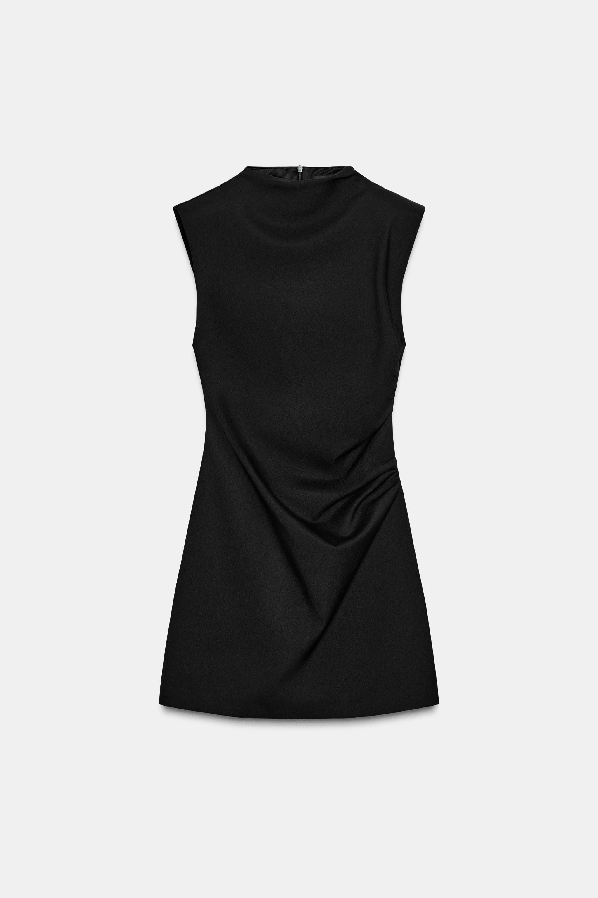 Short dress with shoulder pads