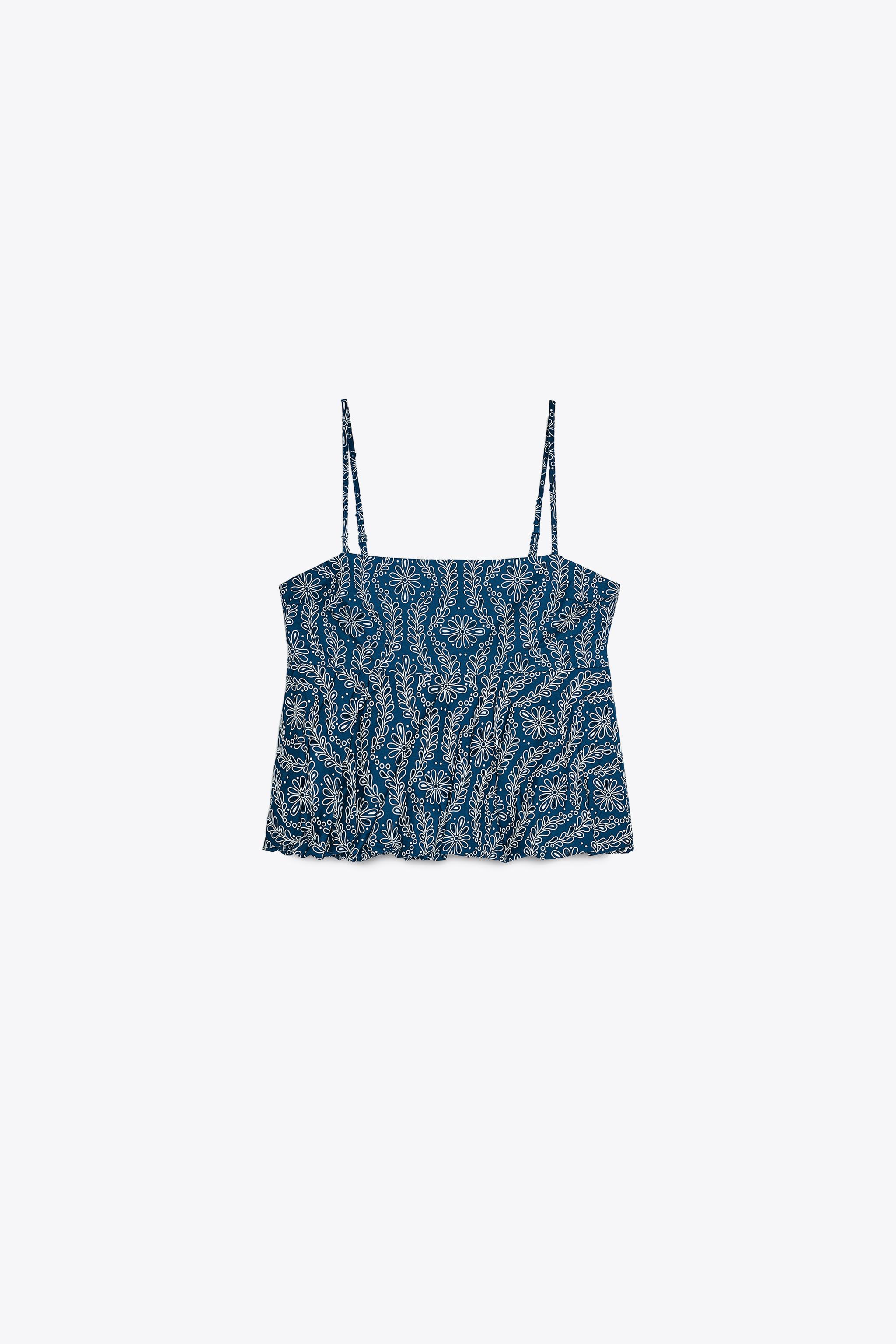Top with eyelet embroidery