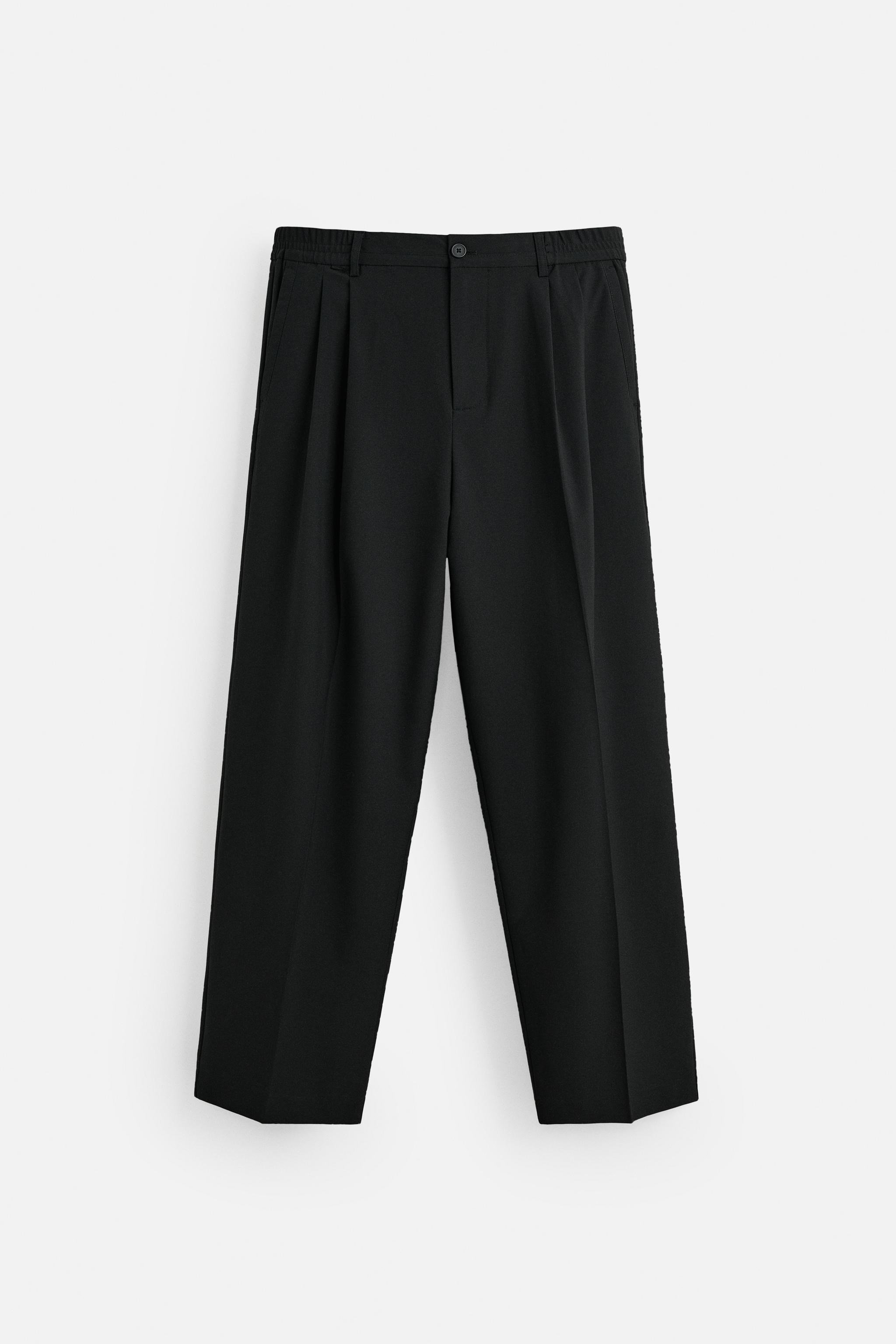 Wide-leg pleated trousers