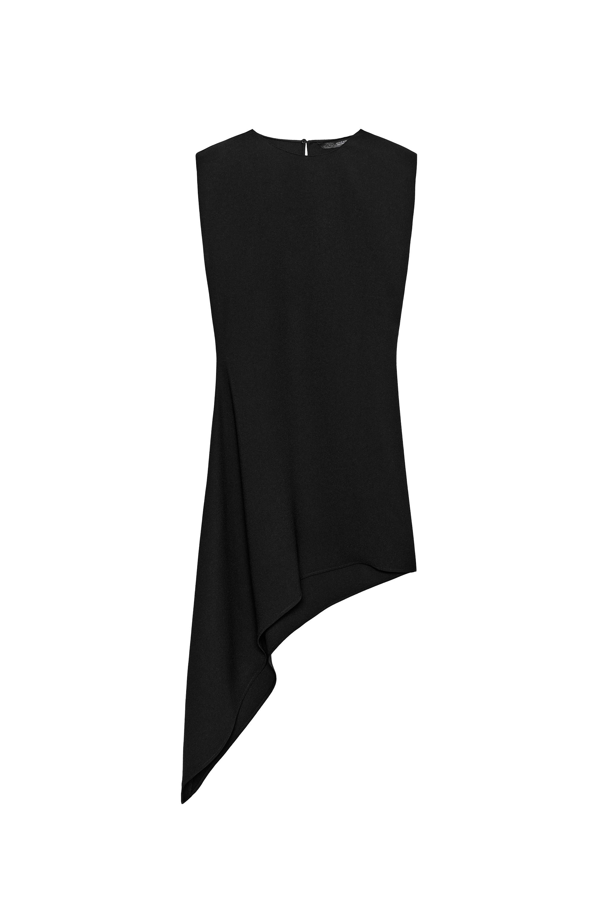 Asymmetric shoulder-pad dress