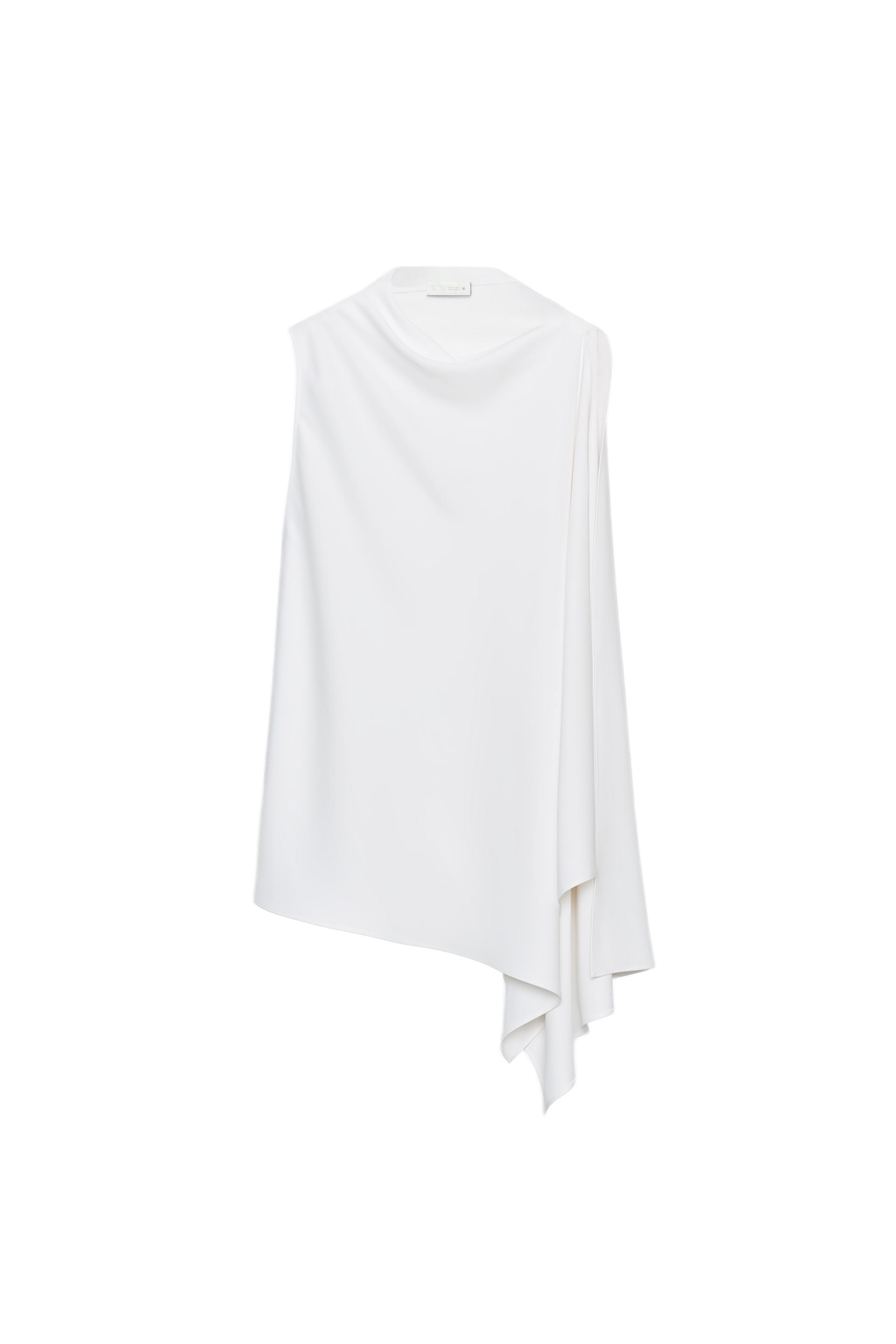 Asymmetric cape top