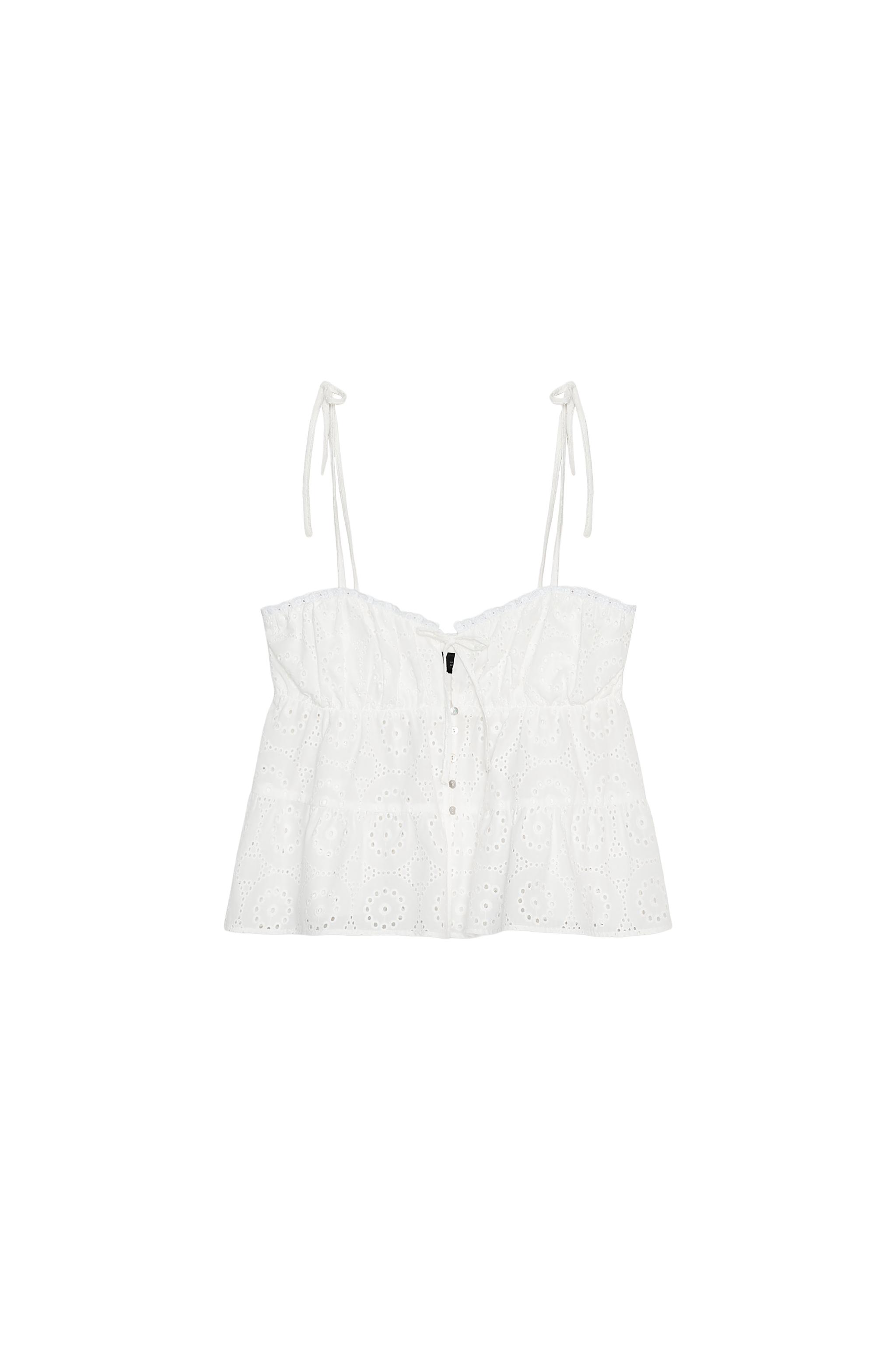 Top embroidered holes