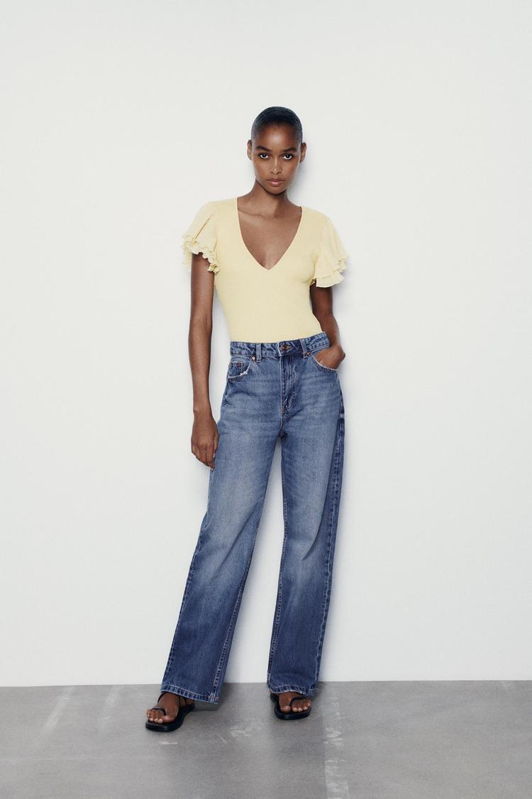 RIBBED BODYSUIT WITH RUFFLES