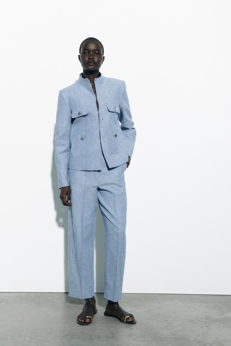 STRAIGHT-LEG TROUSERS WITH TURN-UP HEMS