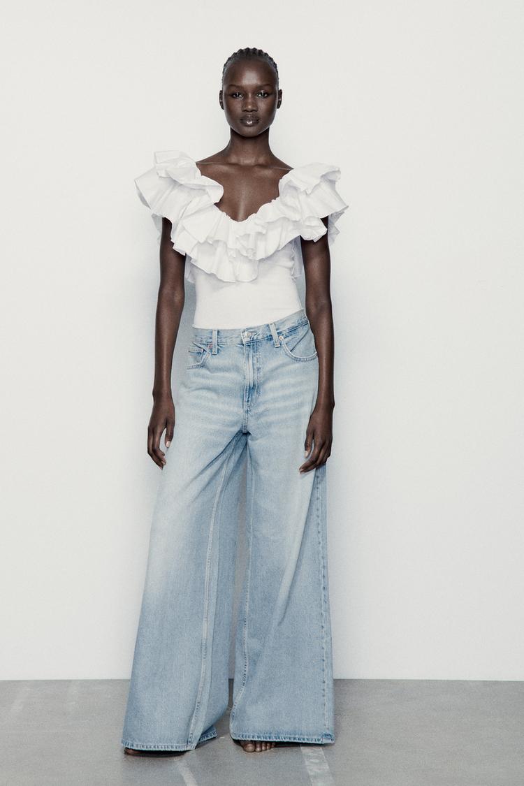 RIBBED BODYSUIT WITH RUFFLES