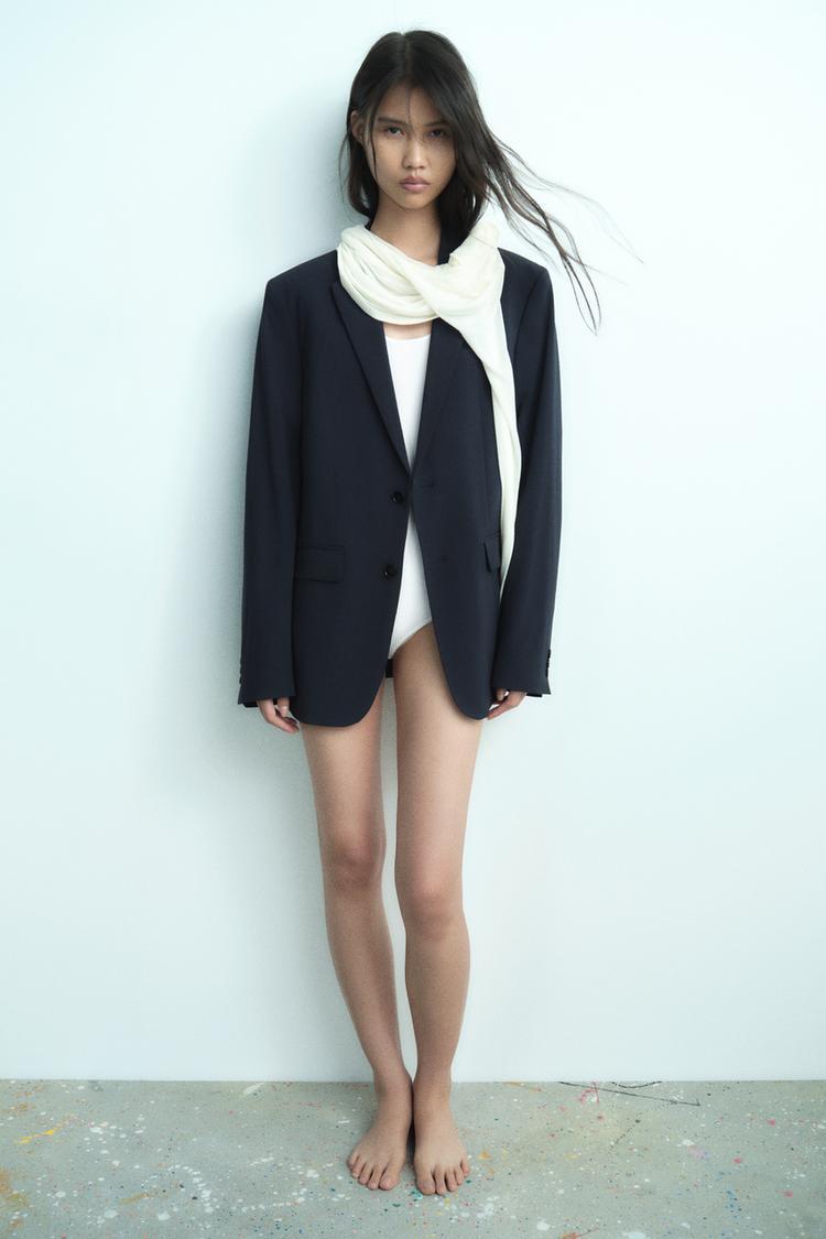 KNIT BODYSUIT WITH LOW-CUT BACK