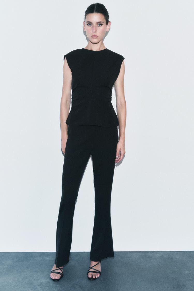 FLARE TROUSERS WITH SIDE VENTS