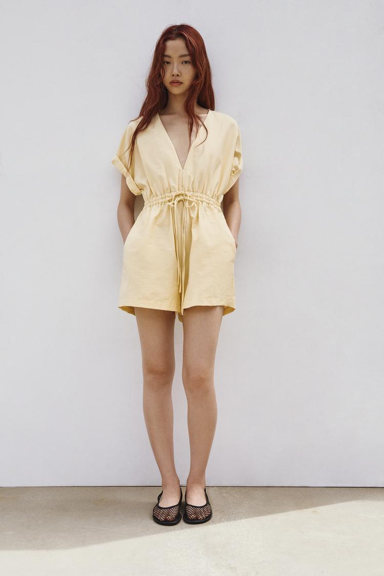 SHORT JUMPSUIT WITH TIED BOW