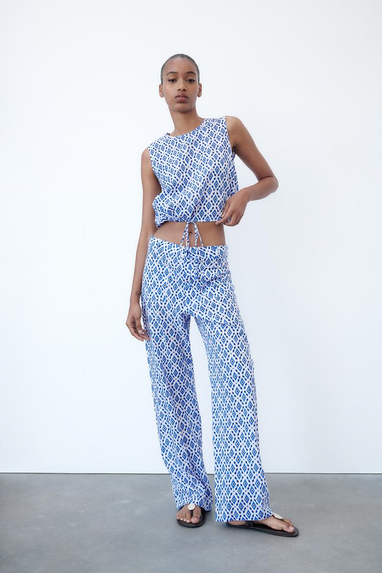 PRINTED TOP WITH TIED DETAILS