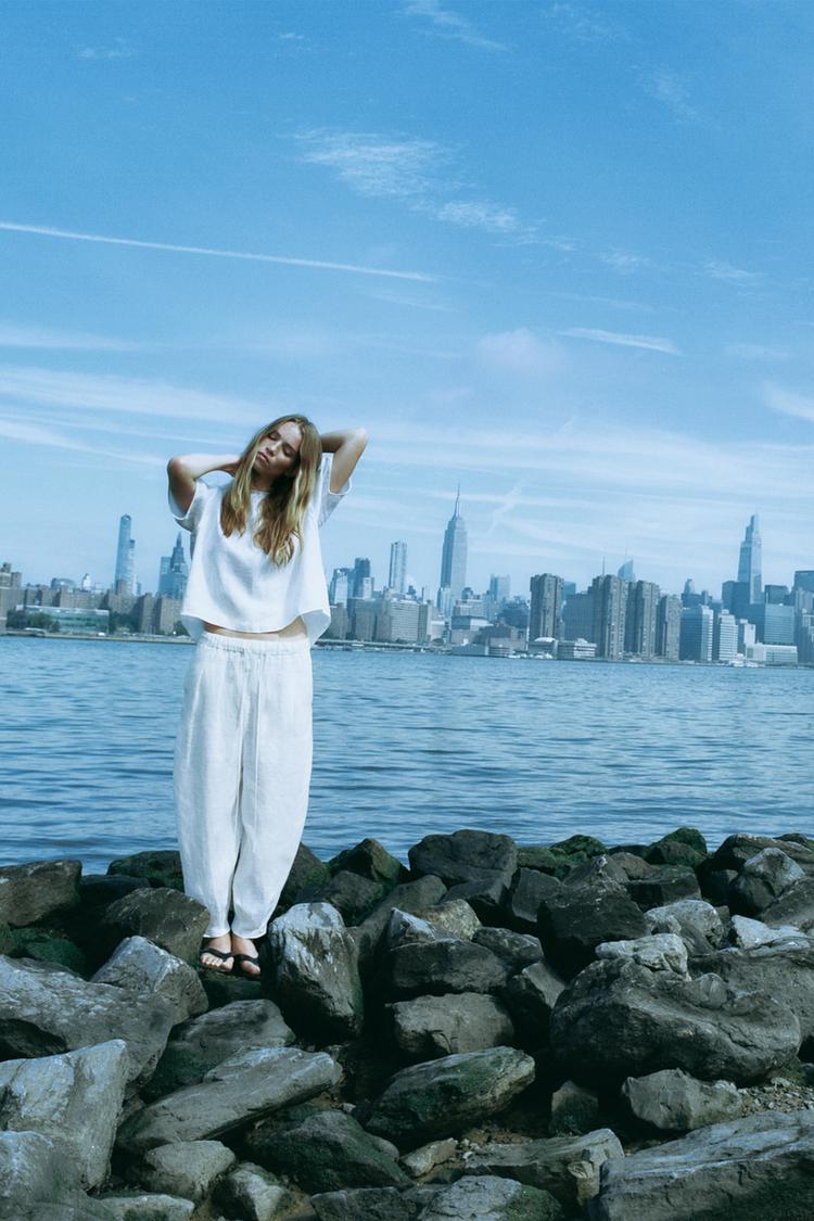 VOLUMINOUS LINEN TROUSERS