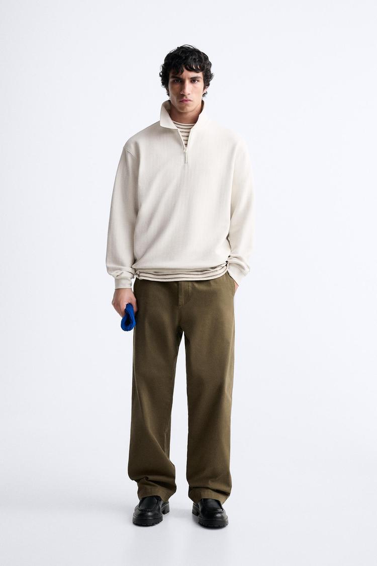 TEXTURED ZIP POLO SHIRT