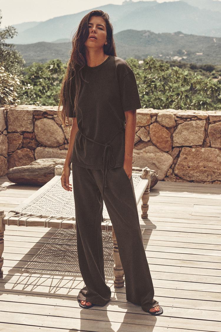 WASHED EFFECT TROUSERS