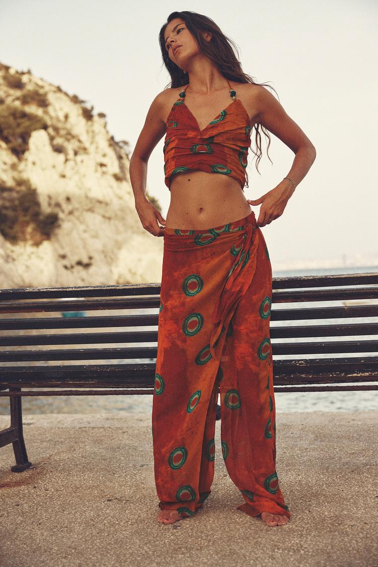 PRINTED WRAP TROUSERS